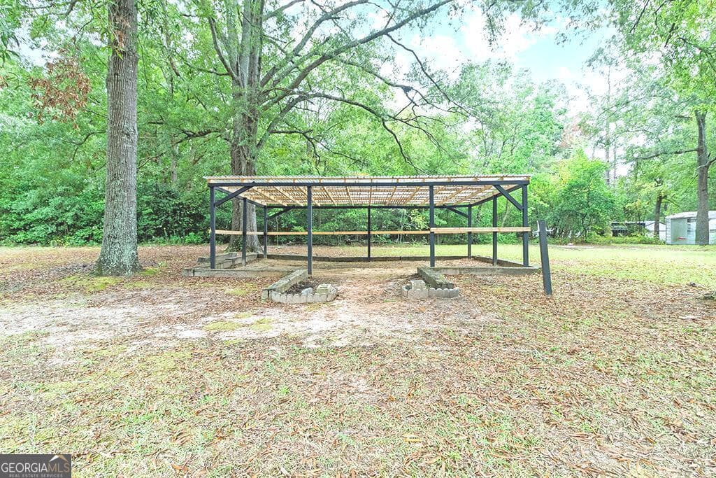4 bedroom, 2 bathroom, 1,803 sq ft single family residence for sale at 518 Cooley Drive, Sandersville, GA 31082 — photo 10