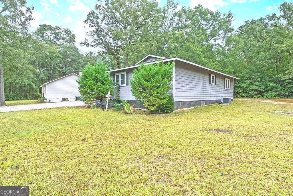 4 bedroom, 2 bathroom, 1,803 sq ft single family residence for sale at 518 Cooley Drive, Sandersville, GA 31082 — photo 8