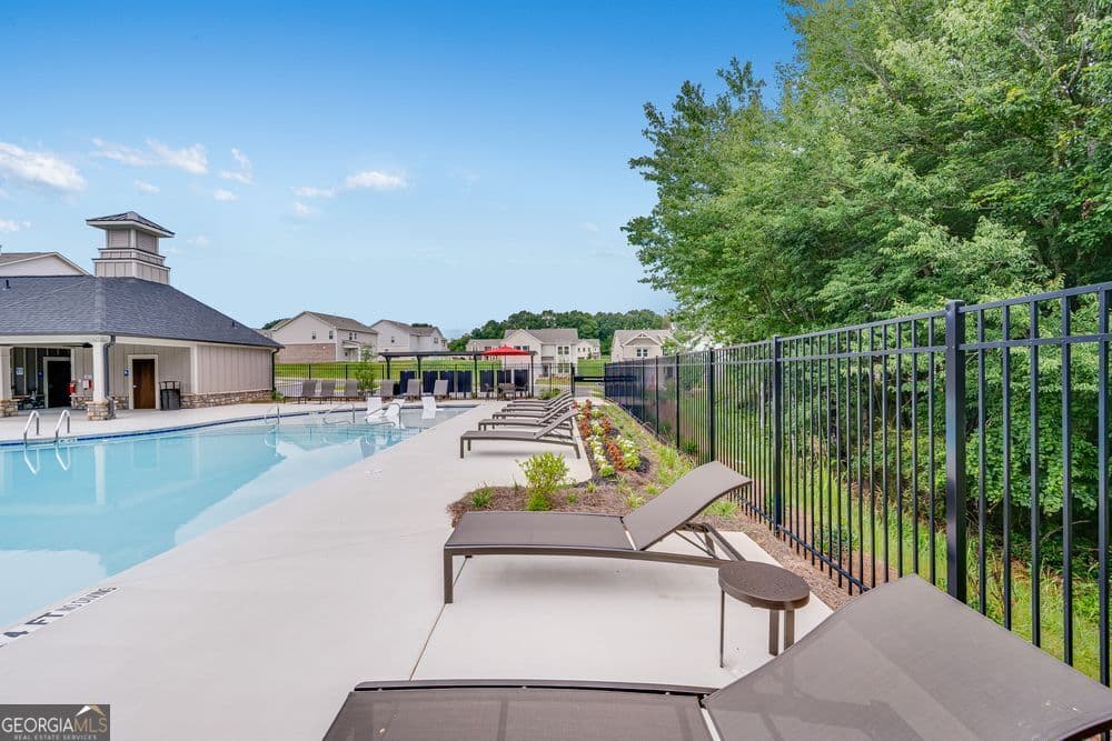 4 bedroom, 3.5 bathroom, 2,779 sq ft single family residence for sale at 1644 Fawlocke Run, Loganville, GA 30052 — photo 9