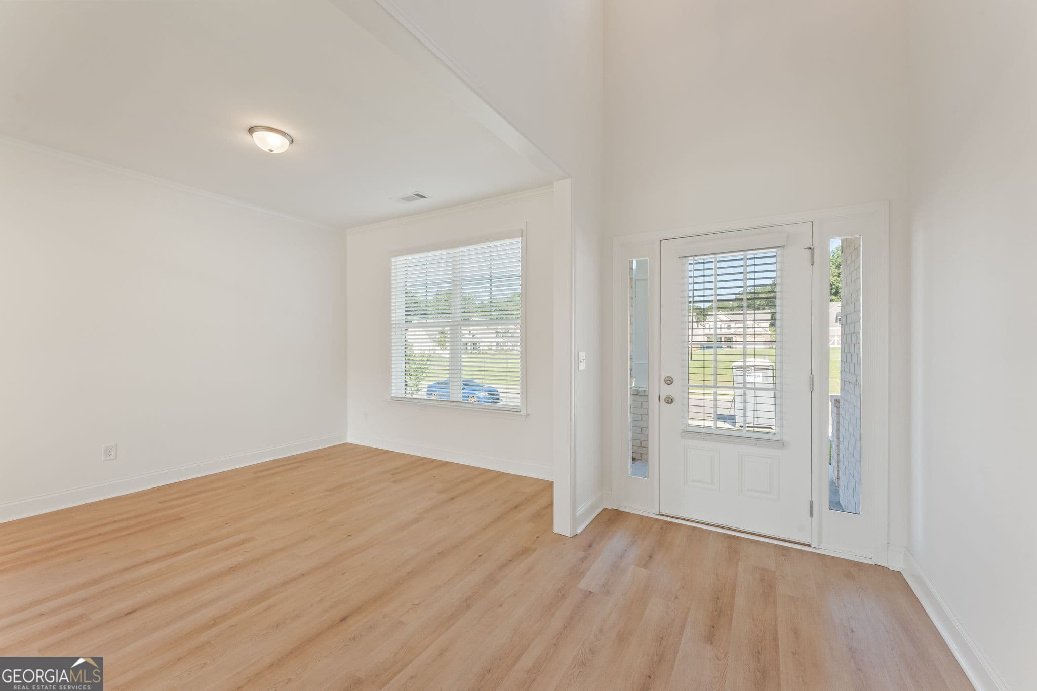 4 bedroom, 2.5 bathroom, 2,626 sq ft single family residence for sale at 3996 Lockaby Way, Lawrenceville, GA 30044 — photo 2