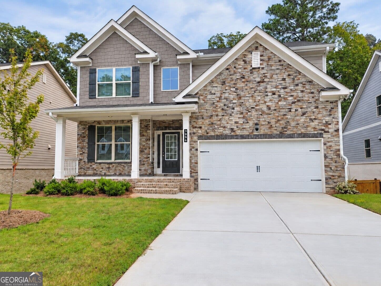 4 bedroom, 2.5 bathroom, 2,626 sq ft single family residence for sale at 3996 Lockaby Way, Lawrenceville, GA 30044 — photo 1 of 18