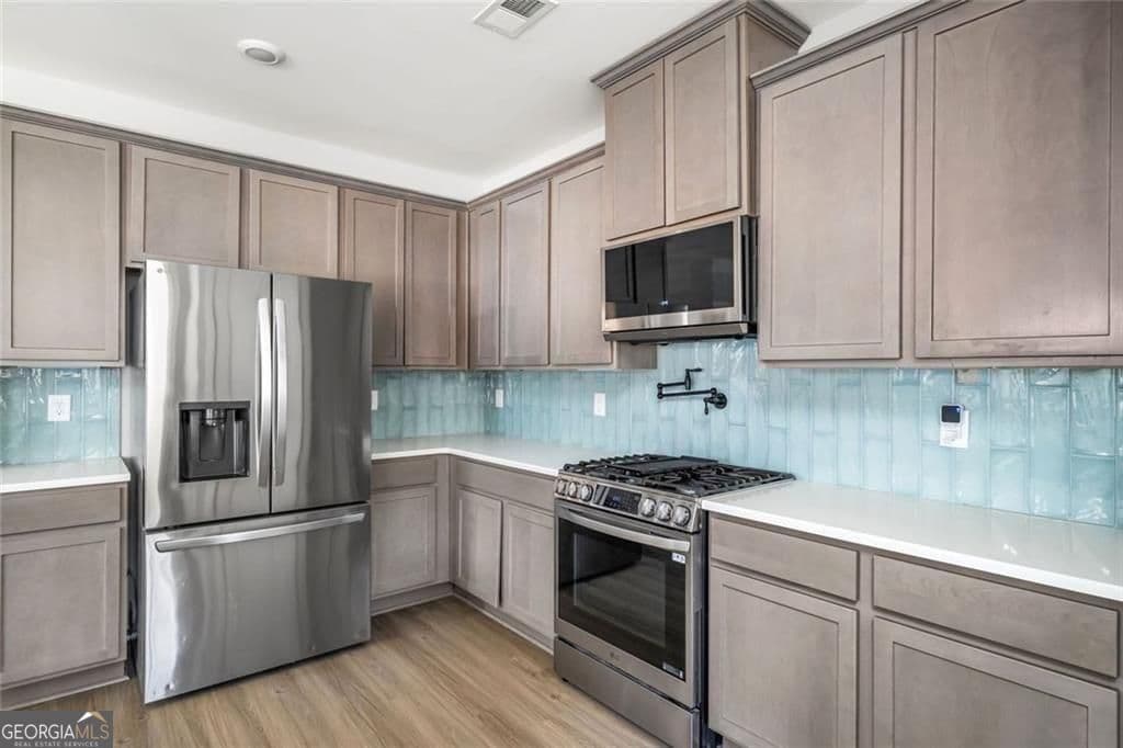 6 bedroom, 4.5 bathroom, 3,470 sq ft single family residence for sale at 233 Mountain Ashe Lane, Dallas, GA 30132 — photo 10