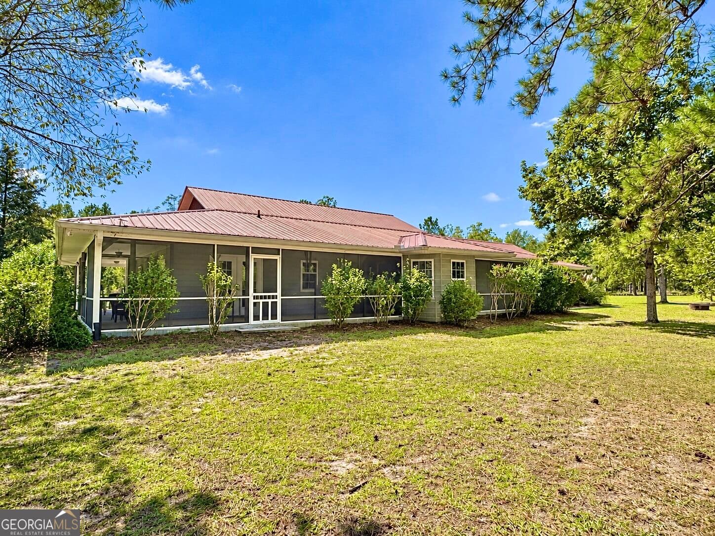 7 bedroom, 5.5 bathroom, 4,622 sq ft single family residence for sale at 241 Foskey Cem Road, Adrian, GA 31002 — photo 6