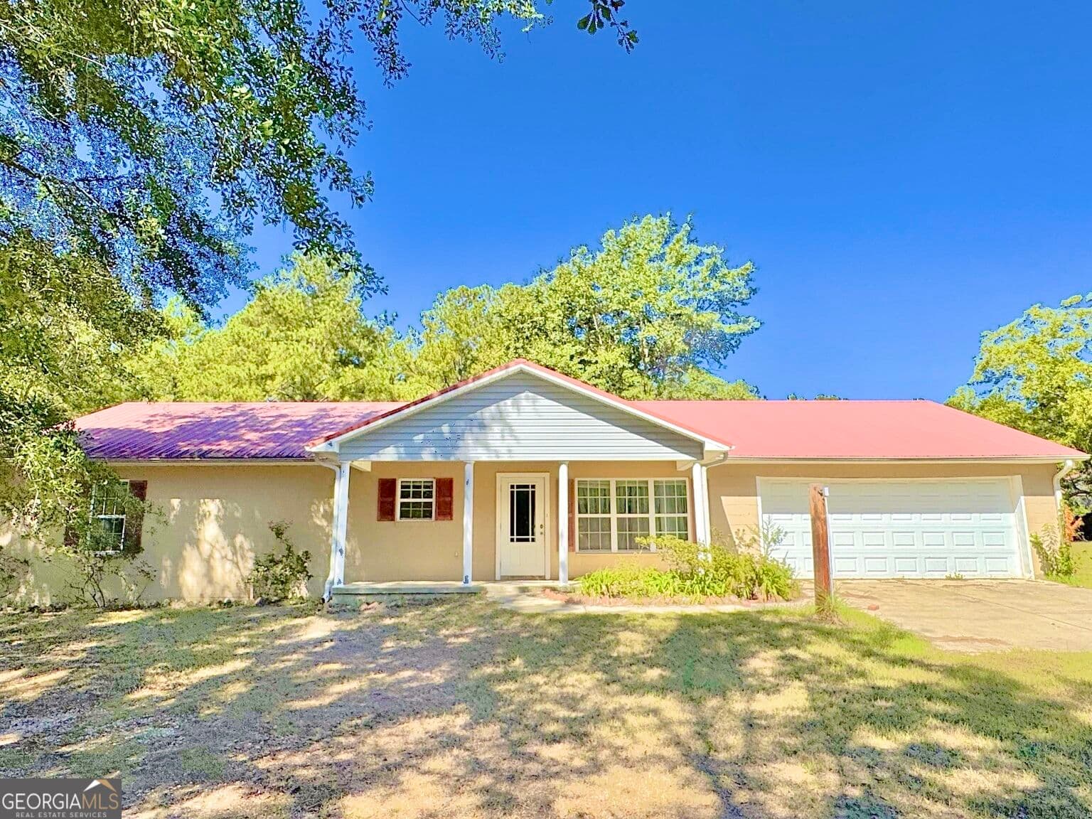 7 bedroom, 5.5 bathroom, 4,622 sq ft single family residence for sale at 241 Foskey Cem Road, Adrian, GA 31002 — photo 3