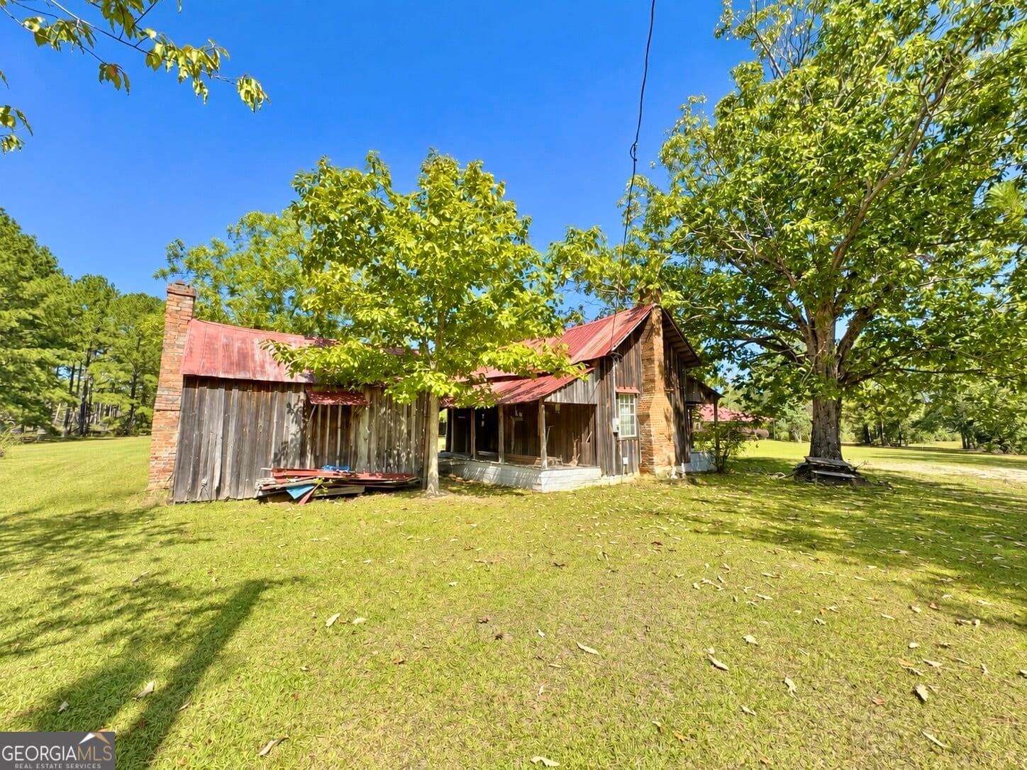 7 bedroom, 5.5 bathroom, 4,622 sq ft single family residence for sale at 241 Foskey Cem Road, Adrian, GA 31002 — photo 4