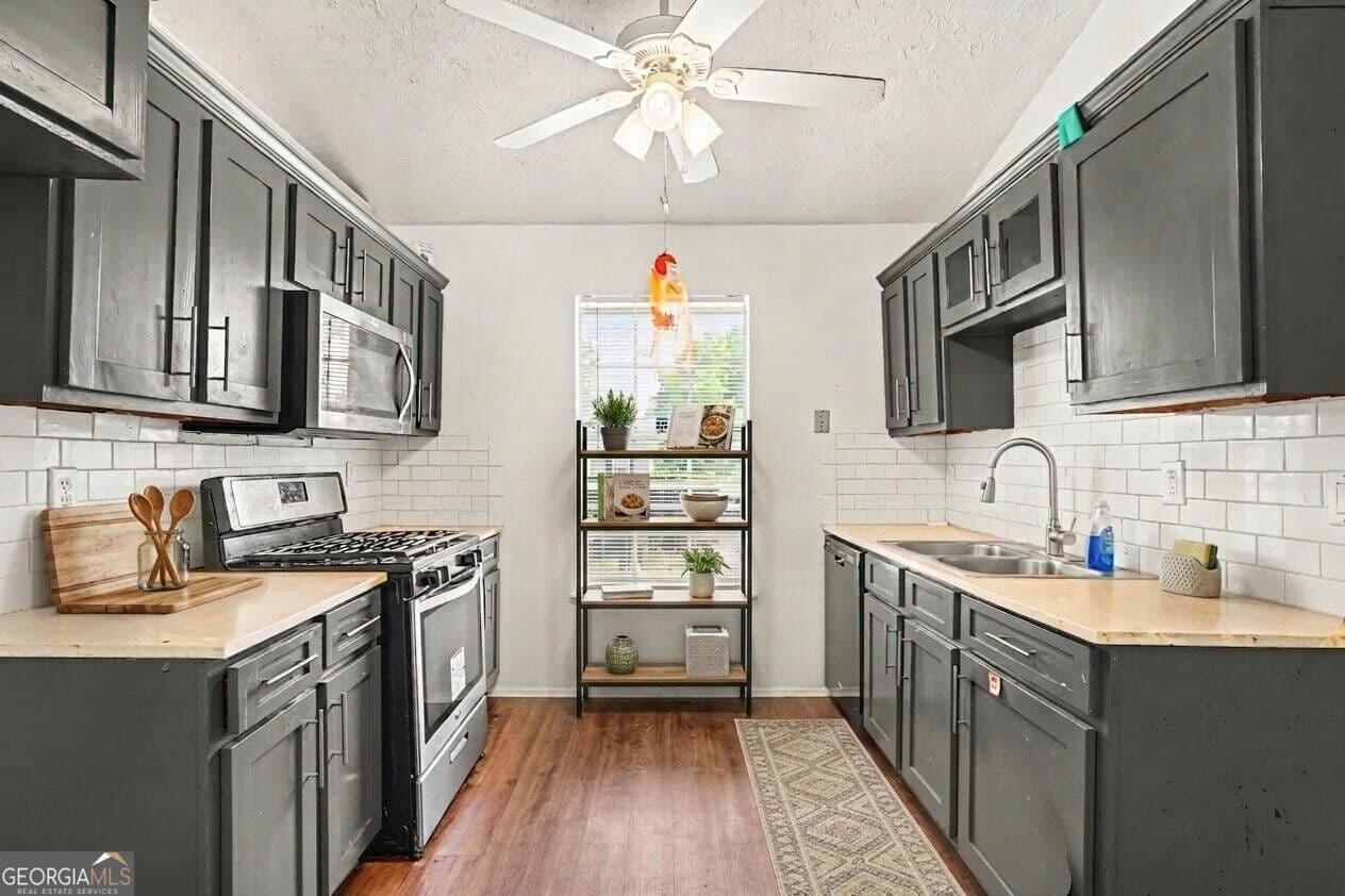3 bedroom, 2 bathroom, 1,048 sq ft townhouse for sale at 2976 Kenville Lane, Decatur, GA 30034 — photo 2