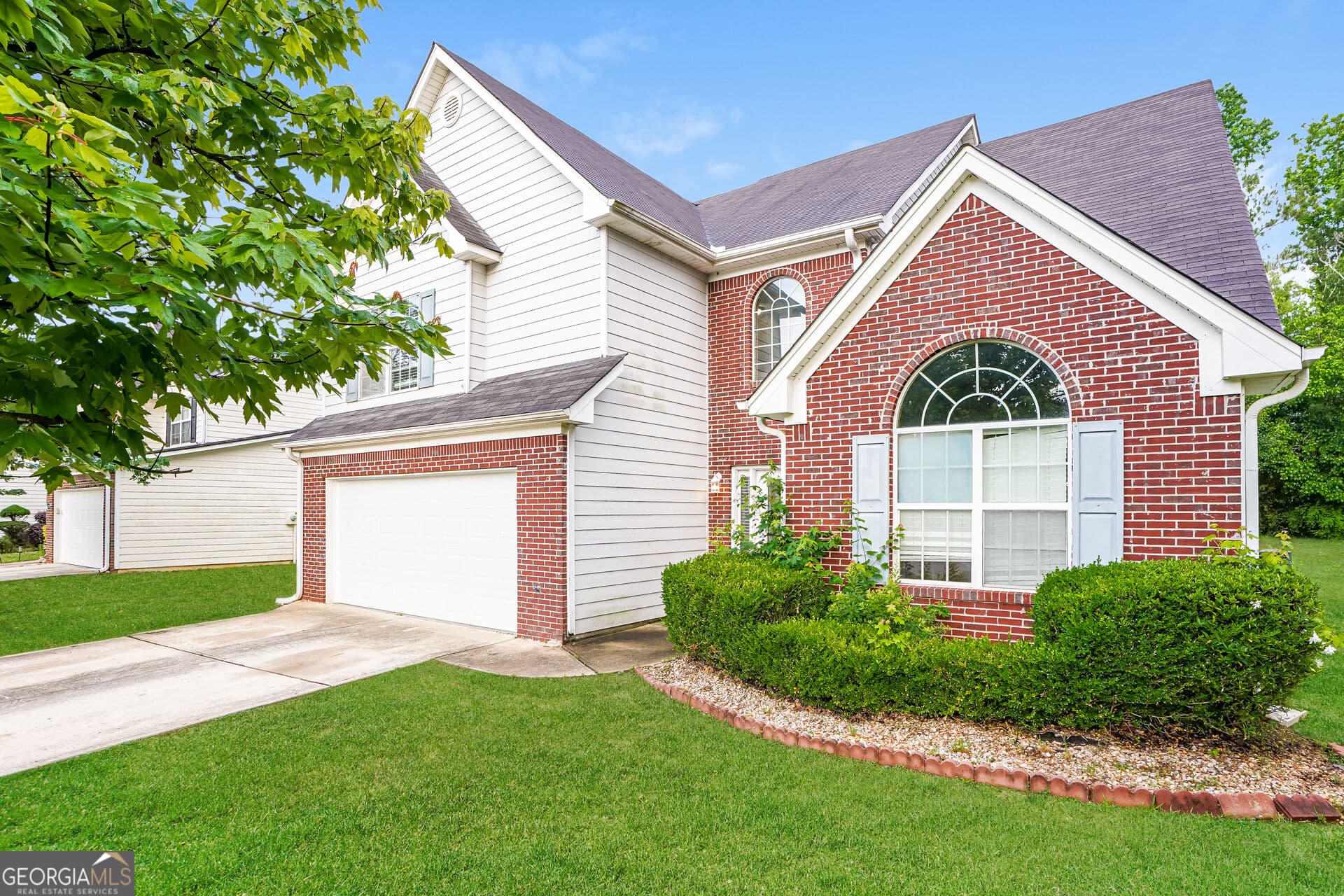 4 bedroom, 2.5 bathroom, 2,642 sq ft single family residence for sale at 1009 Lear Drive, Locust Grove, GA 30248 — photo 2