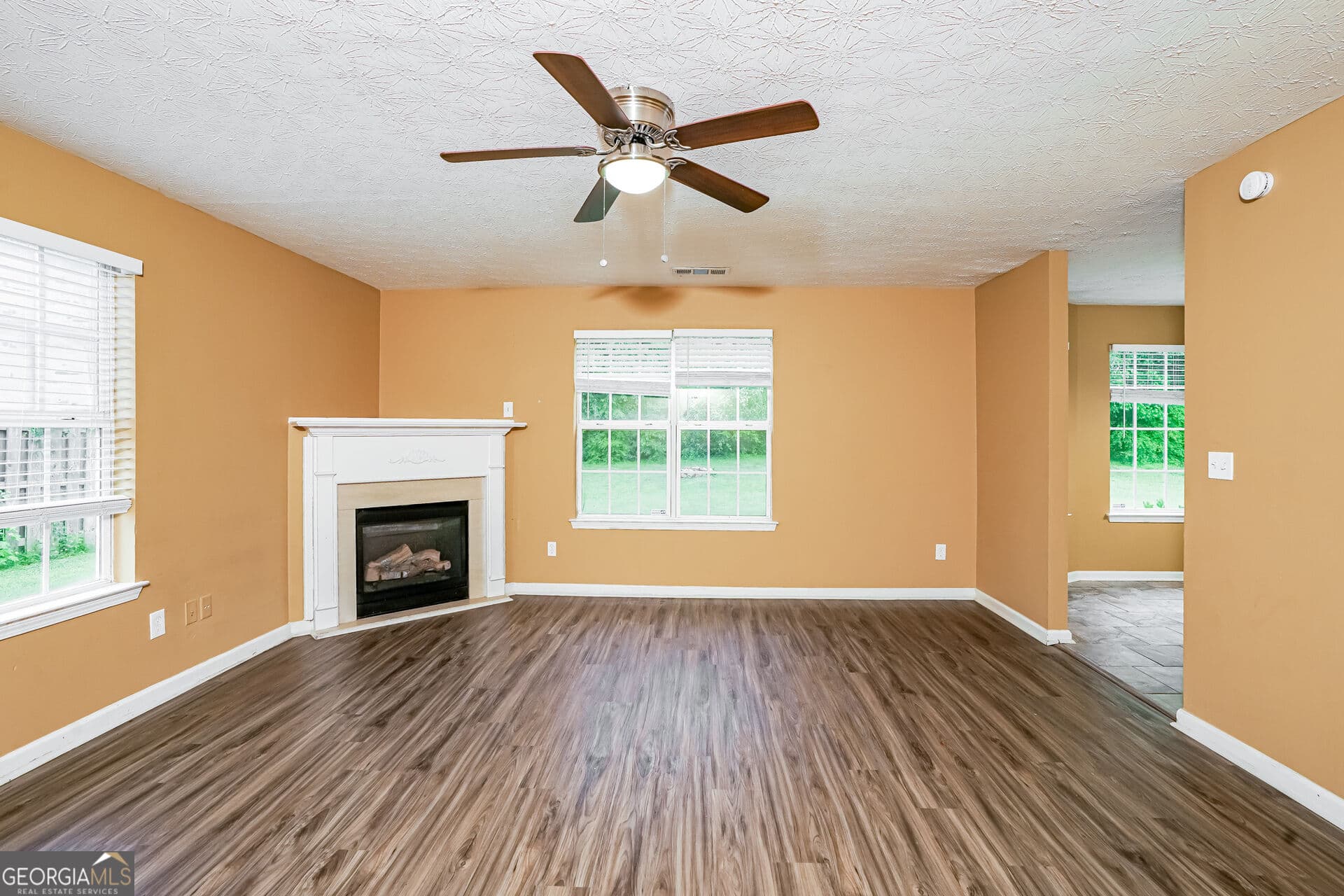 4 bedroom, 2.5 bathroom, 2,642 sq ft single family residence for sale at 1009 Lear Drive, Locust Grove, GA 30248 — photo 3