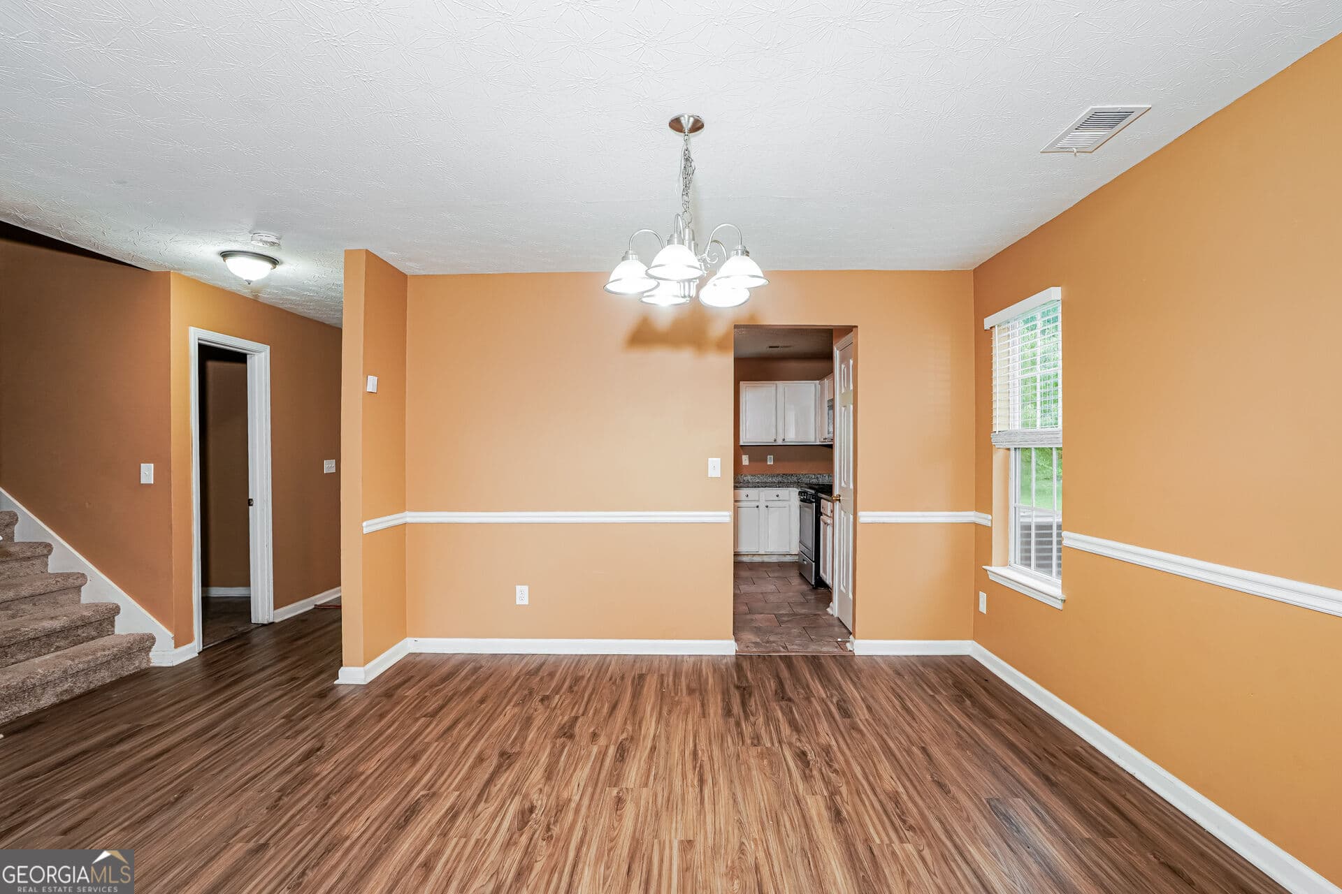 4 bedroom, 2.5 bathroom, 2,642 sq ft single family residence for sale at 1009 Lear Drive, Locust Grove, GA 30248 — photo 4