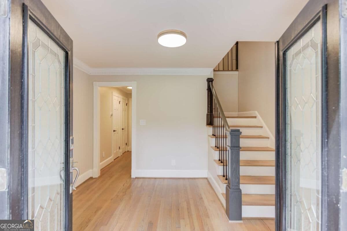 6 bedroom, 5 bathroom, 5,110 sq ft single family residence for sale at 7680 Ryefield Drive, Sandy Springs, GA 30350 — photo 5