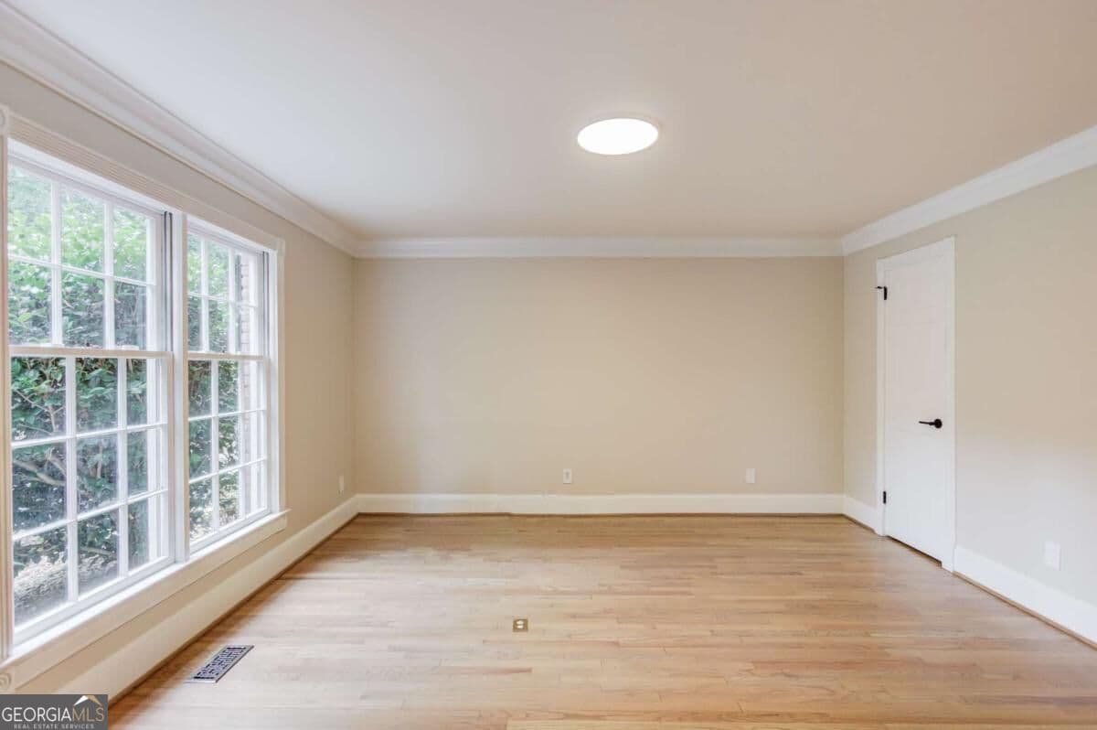 6 bedroom, 5 bathroom, 5,110 sq ft single family residence for sale at 7680 Ryefield Drive, Sandy Springs, GA 30350 — photo 8