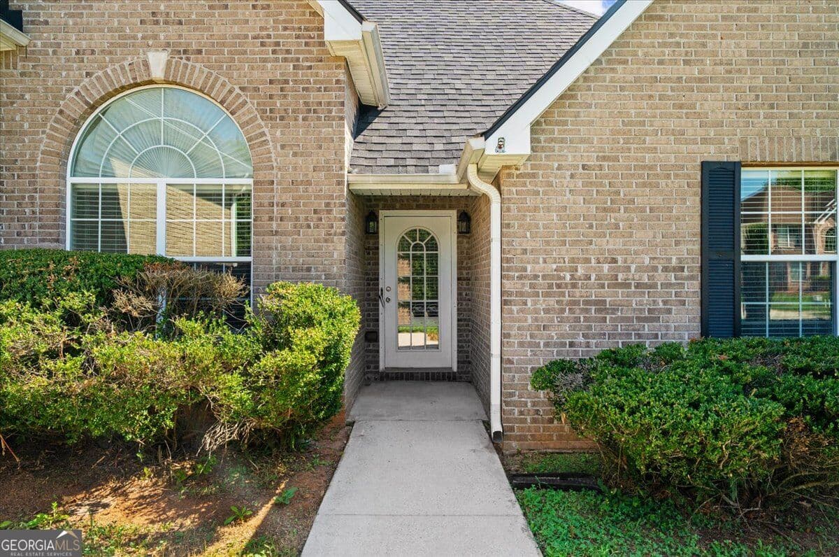 4 bedroom, 3 bathroom, 2,104 sq ft single family residence for sale at 1457 Shelnut Court, Hampton, GA 30228 — photo 3