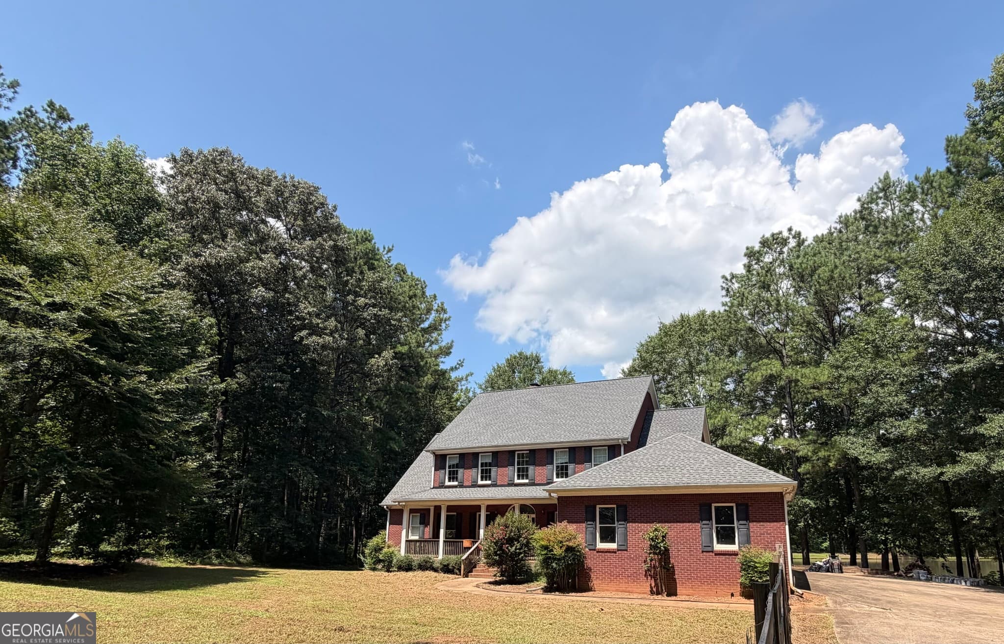 6 bedroom, 5 bathroom, 5,710 sq ft single family residence for sale at 1917 Al Roberts Road, Senoia, GA 30276 — photo 1 of 20