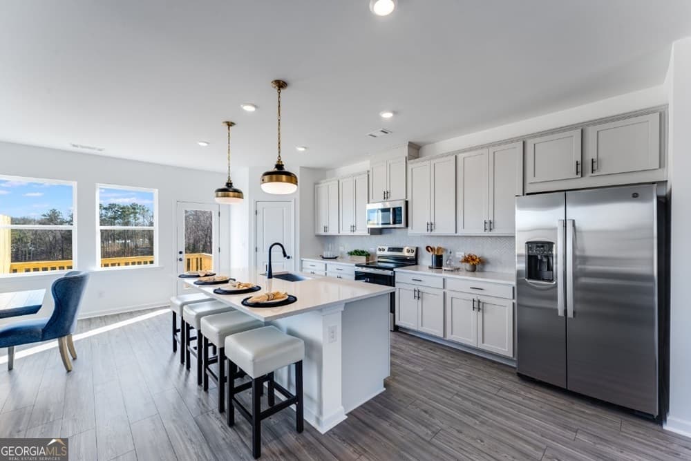 4 bedroom, 3.5 bathroom, 2,375 sq ft townhouse for sale at 98 Wilder Ridge Way, Lawrenceville, GA 30044 — photo 2
