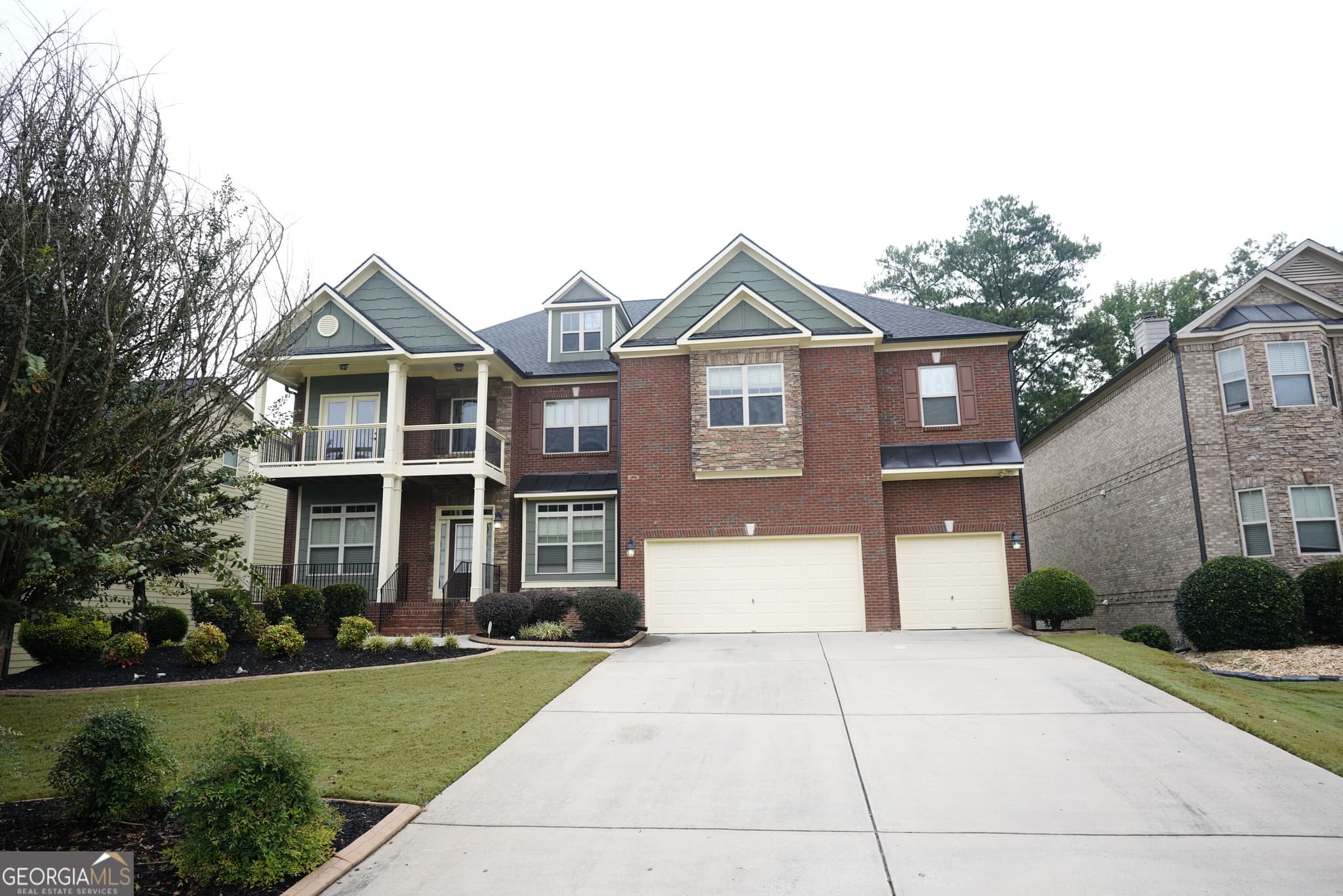 6 bedroom, 5 bathroom, 6,786 sq ft single family residence for sale at 3653 Lake Estates Way, Atlanta, GA 30349 — photo 1 of 33