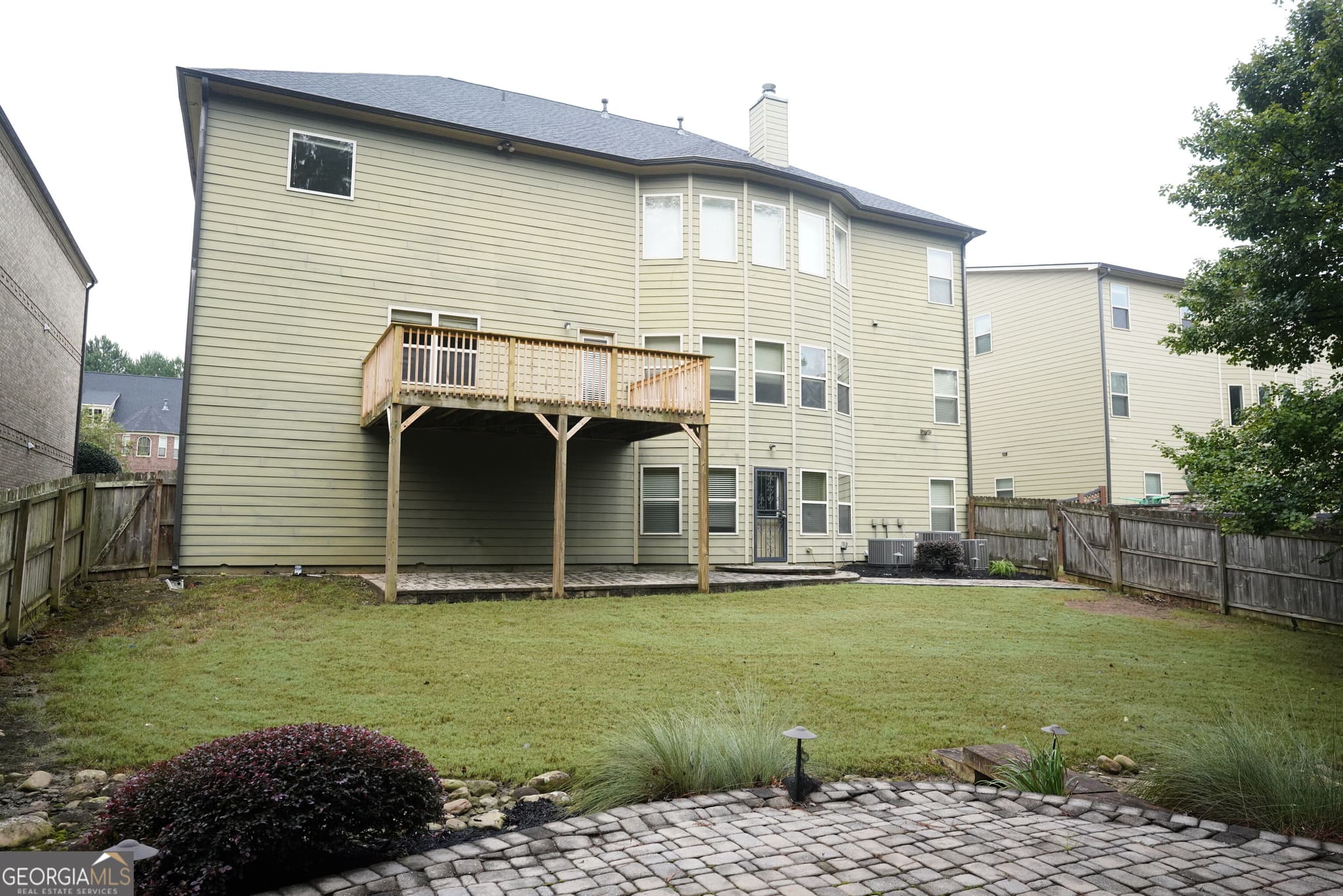 6 bedroom, 5 bathroom, 6,786 sq ft single family residence for sale at 3653 Lake Estates Way, Atlanta, GA 30349 — photo 4