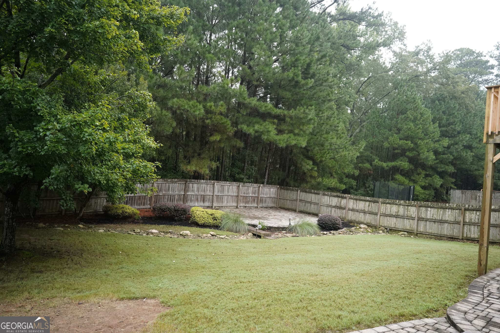 6 bedroom, 5 bathroom, 6,786 sq ft single family residence for sale at 3653 Lake Estates Way, Atlanta, GA 30349 — photo 8