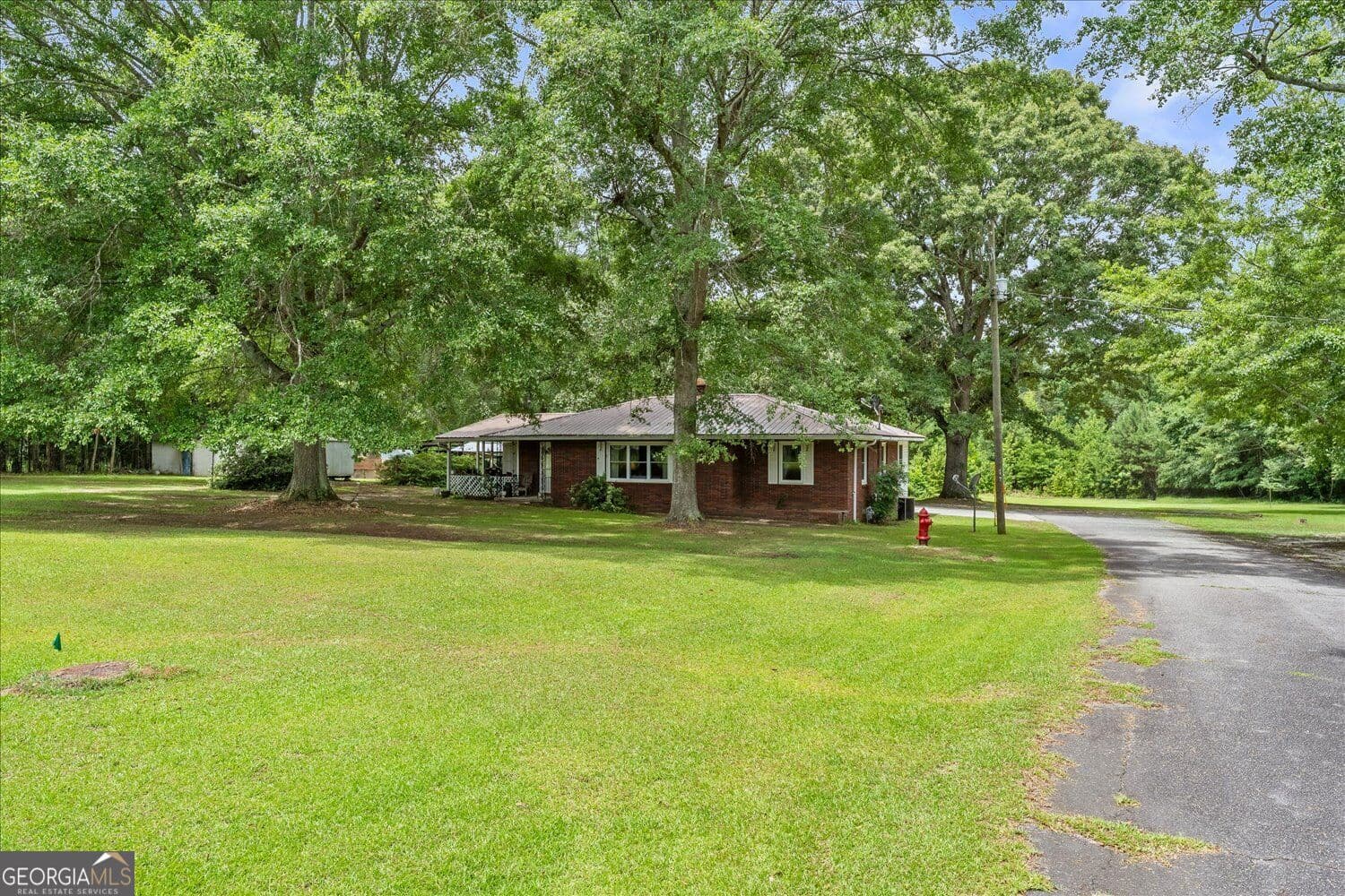 2 bedroom, 2 bathroom, 1,302 sq ft single family residence for sale at 130 Washington Street, Tignall, GA 30668 — photo 2