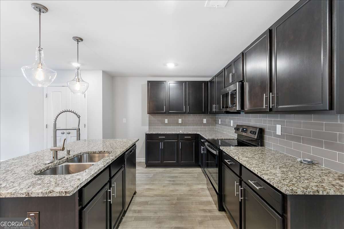 4 bedroom, 2.5 bathroom, 2,322 sq ft single family residence for sale at 6426 Beaver Creek Trail, South Fulton, GA 30349 — photo 2