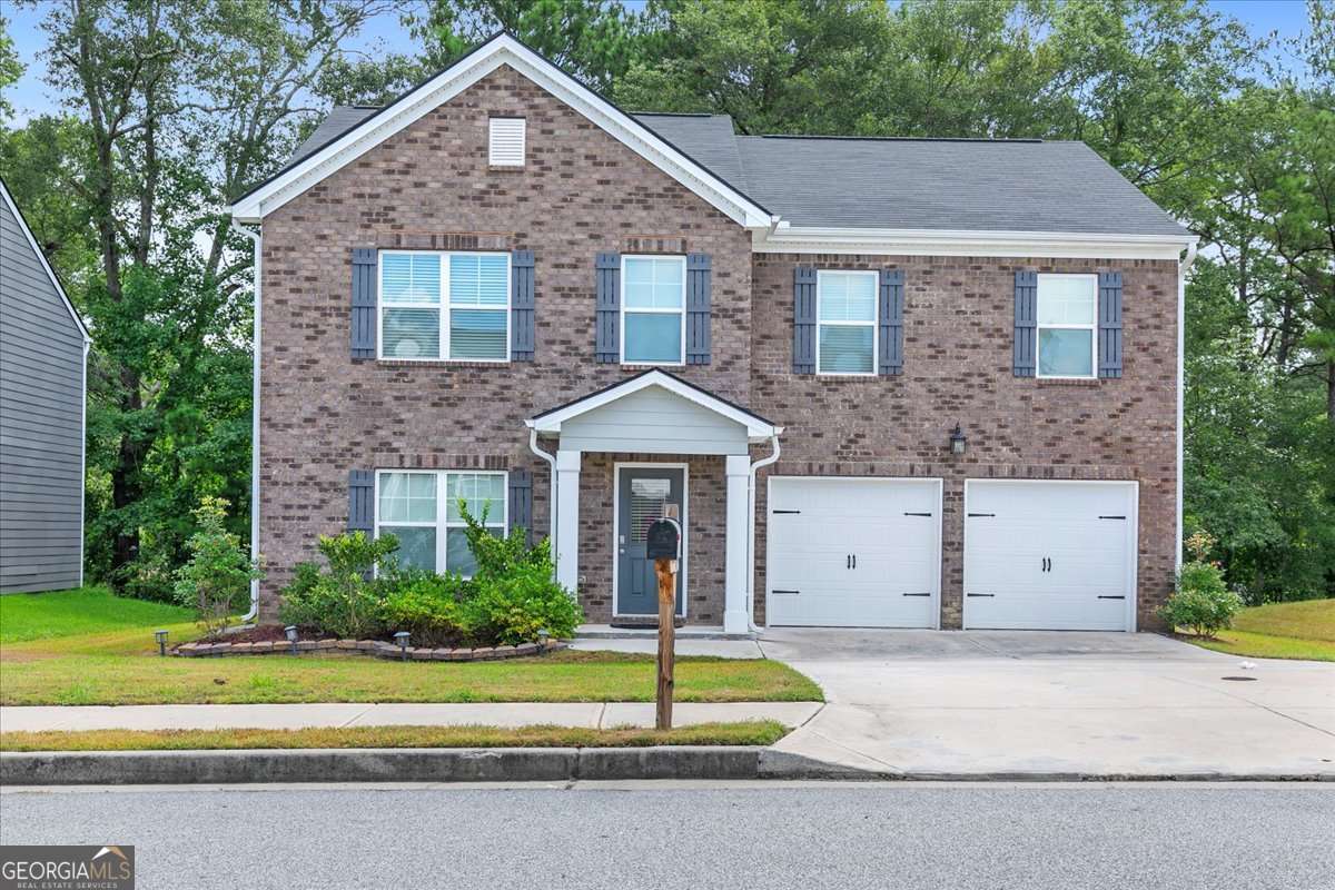 4 bedroom, 2.5 bathroom, 2,322 sq ft single family residence for sale at 6426 Beaver Creek Trail, South Fulton, GA 30349 — photo 1 of 14