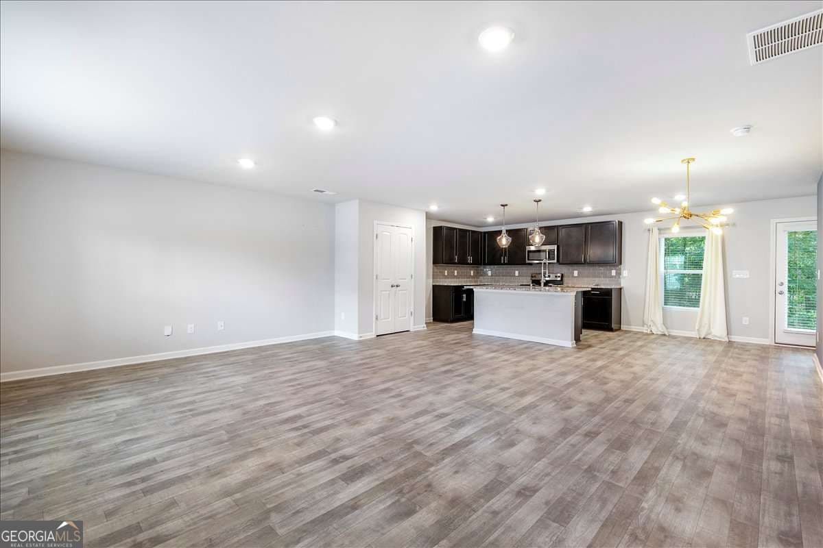 4 bedroom, 2.5 bathroom, 2,322 sq ft single family residence for sale at 6426 Beaver Creek Trail, South Fulton, GA 30349 — photo 4