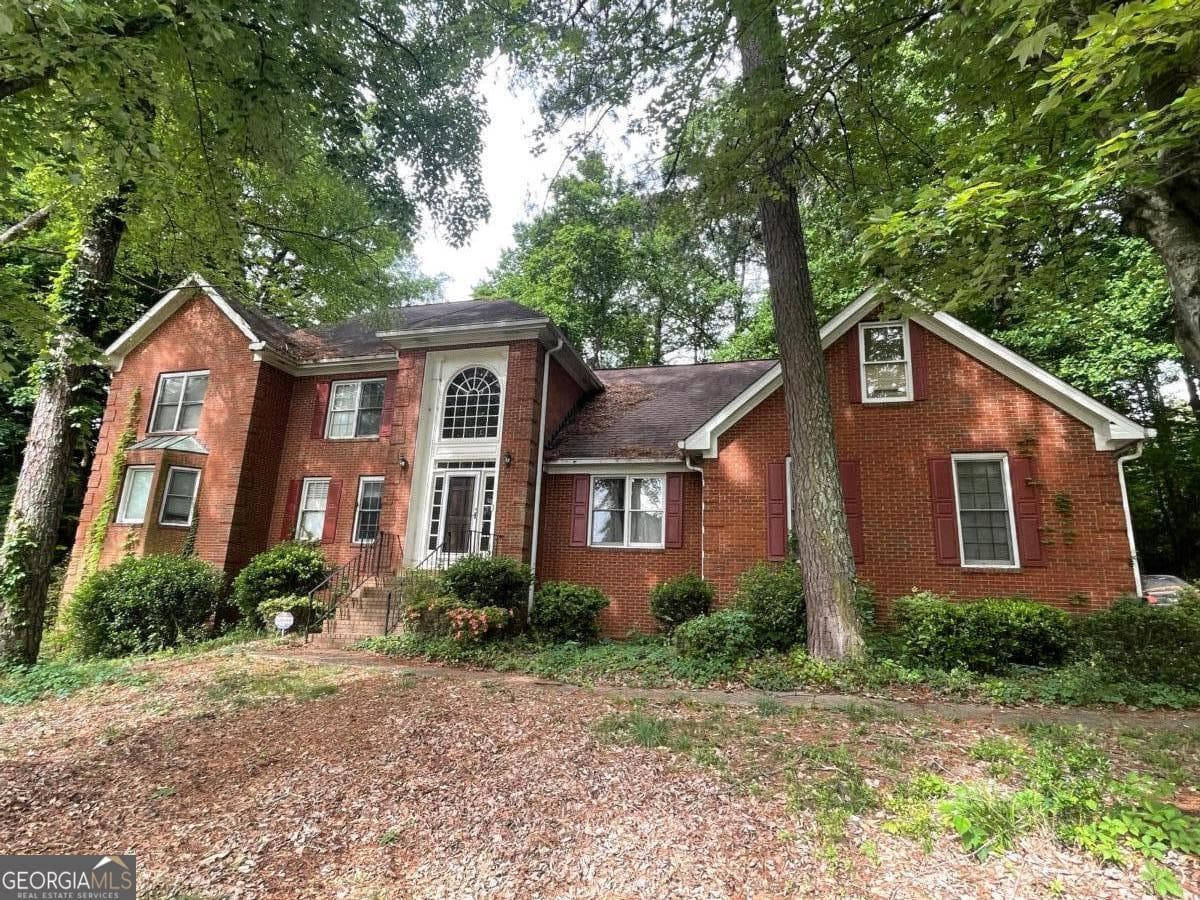 4 bedroom, 3.5 bathroom, 4,064 sq ft single family residence sold at 6770 Ravines Court, Stone Mountain, GA 30087