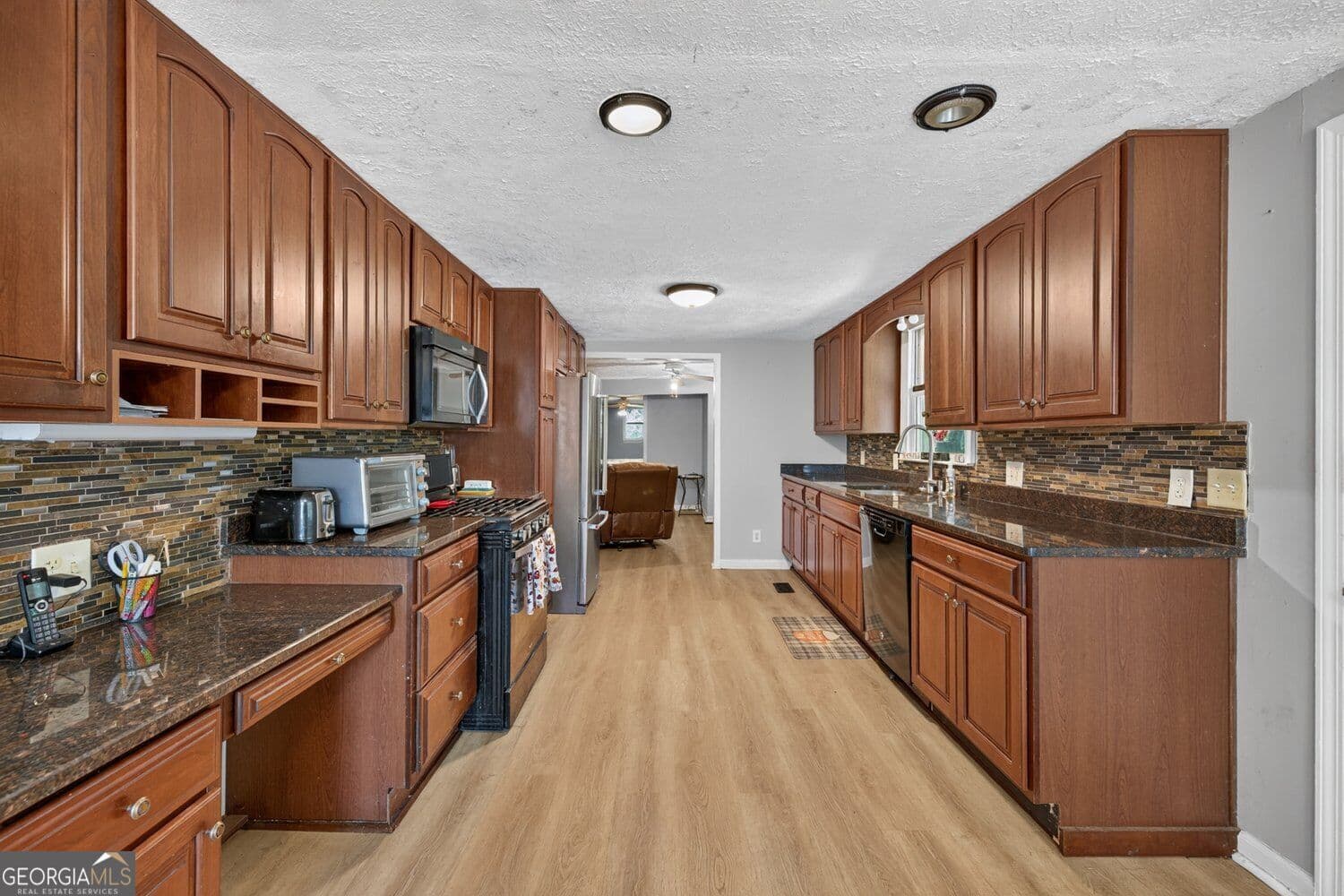 4 bedroom, 3 bathroom, 3,784 sq ft single family residence for sale at 3076 Thompson Mill Road, Buford, GA 30519 — photo 7