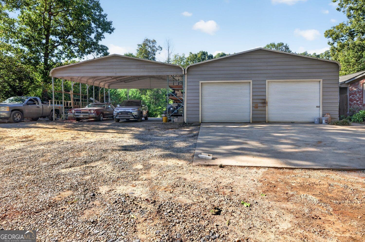 4 bedroom, 3 bathroom, 3,784 sq ft single family residence for sale at 3076 Thompson Mill Road, Buford, GA 30519 — photo 3