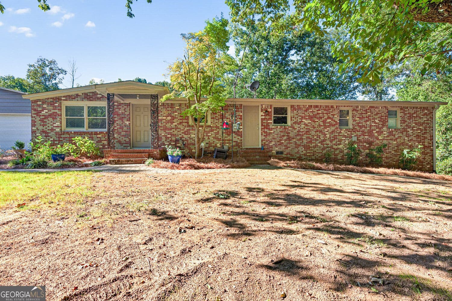 4 bedroom, 3 bathroom, 3,784 sq ft single family residence for sale at 3076 Thompson Mill Road, Buford, GA 30519