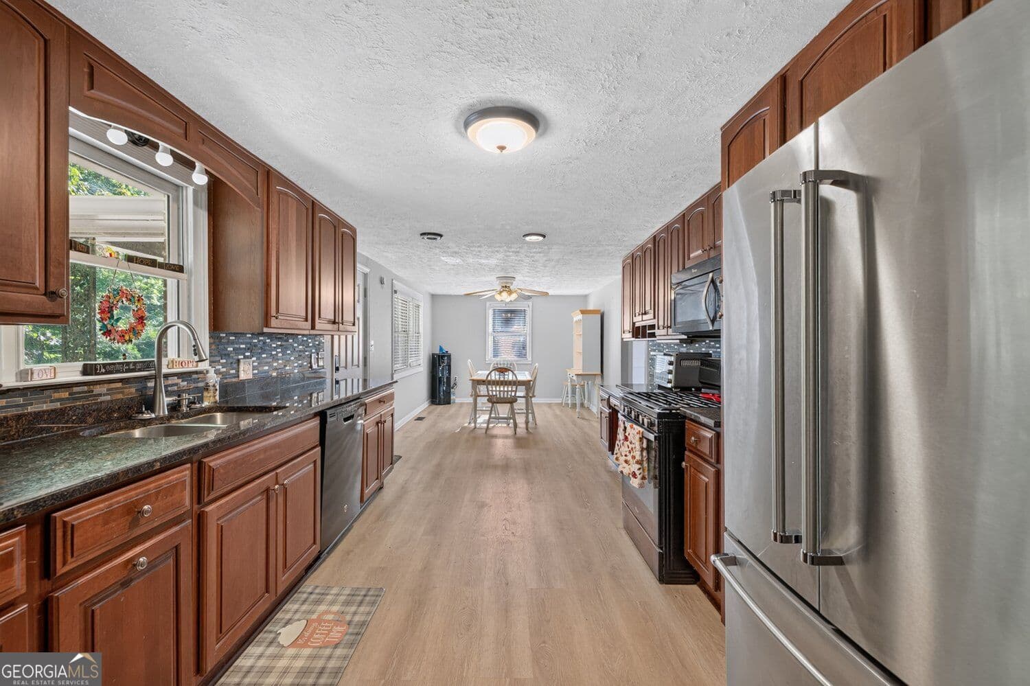 4 bedroom, 3 bathroom, 3,784 sq ft single family residence for sale at 3076 Thompson Mill Road, Buford, GA 30519 — photo 10