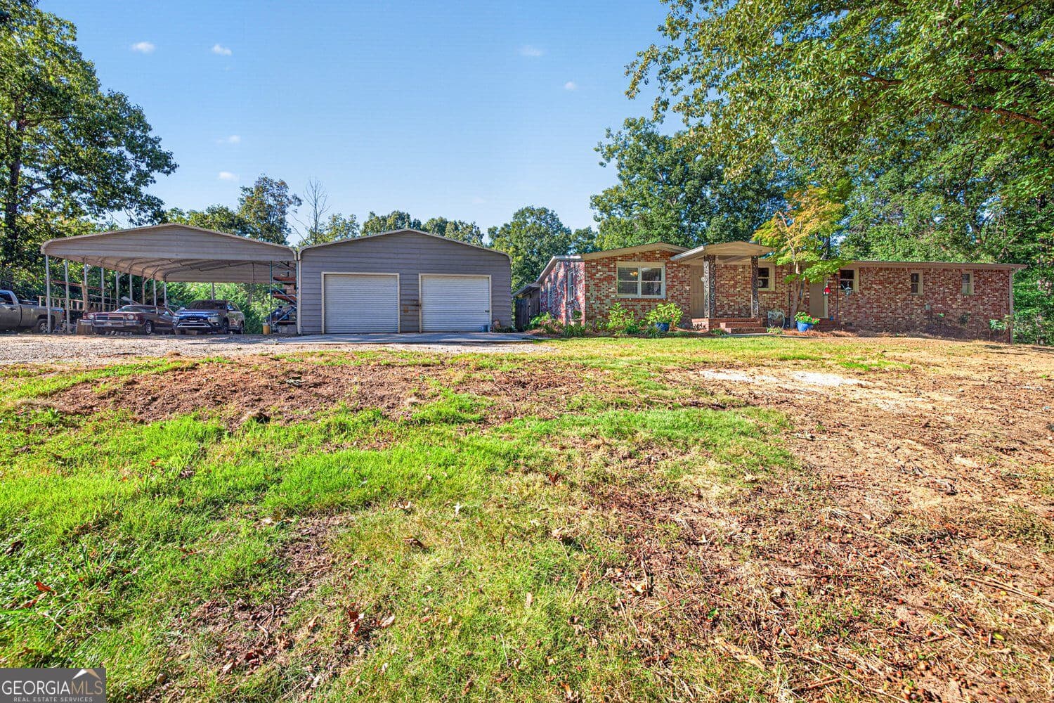 4 bedroom, 3 bathroom, 3,784 sq ft single family residence for sale at 3076 Thompson Mill Road, Buford, GA 30519 — photo 4
