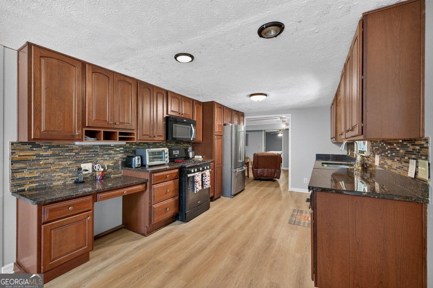 4 bedroom, 3 bathroom, 3,784 sq ft single family residence for sale at 3076 Thompson Mill Road, Buford, GA 30519 — photo 8