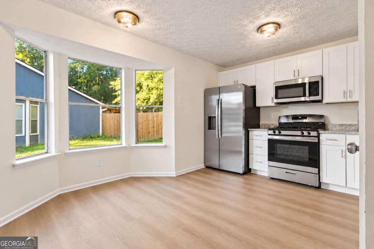 3 bedroom, 2 bathroom, 993 sq ft single family residence for sale at 7060 Greenbower Lane, College Park, GA 30349 — photo 7
