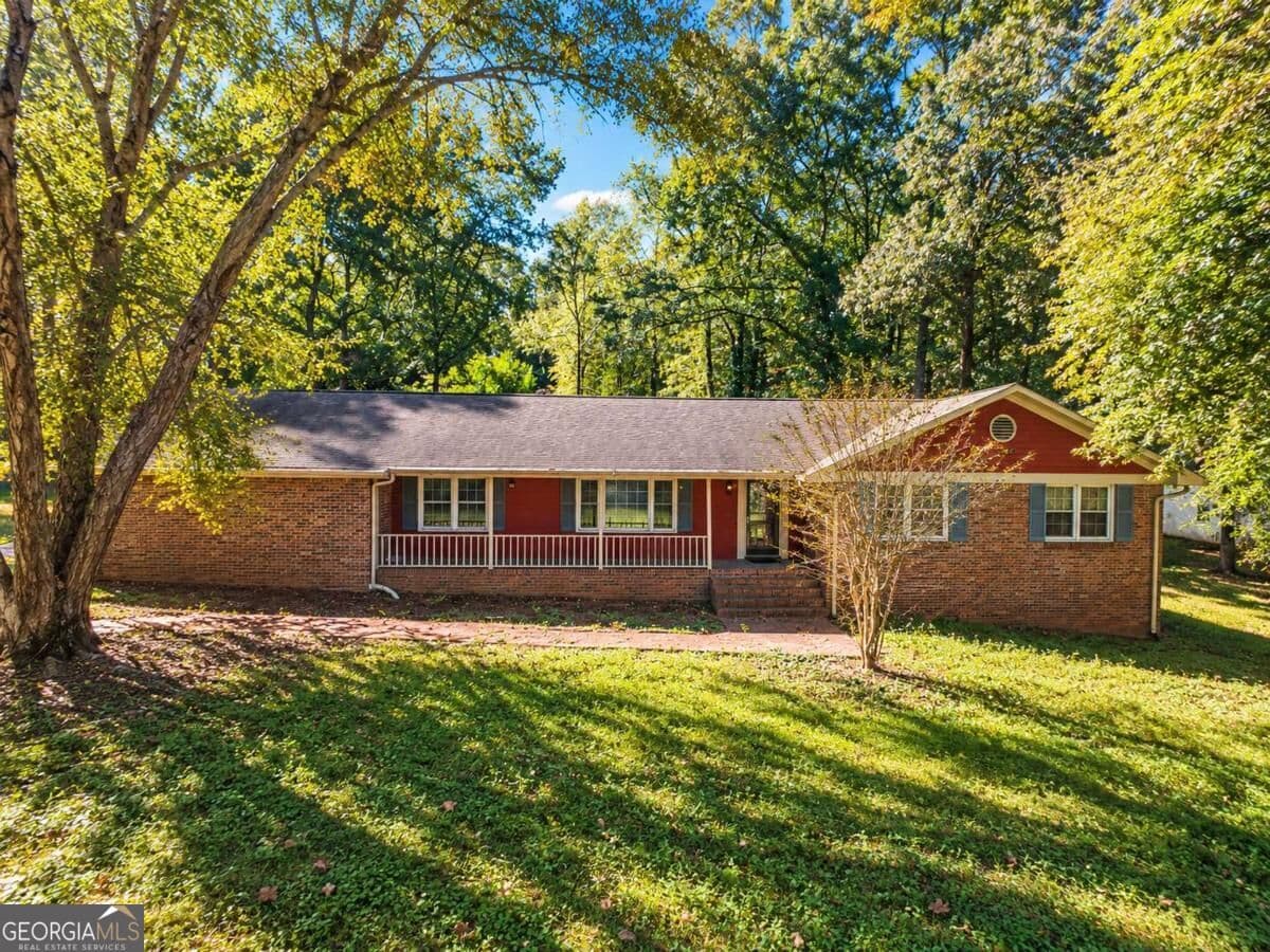 4 bedroom, 2 bathroom, 2,230 sq ft single family residence for sale at 7687 Tyra Cove, Jonesboro, GA 30236