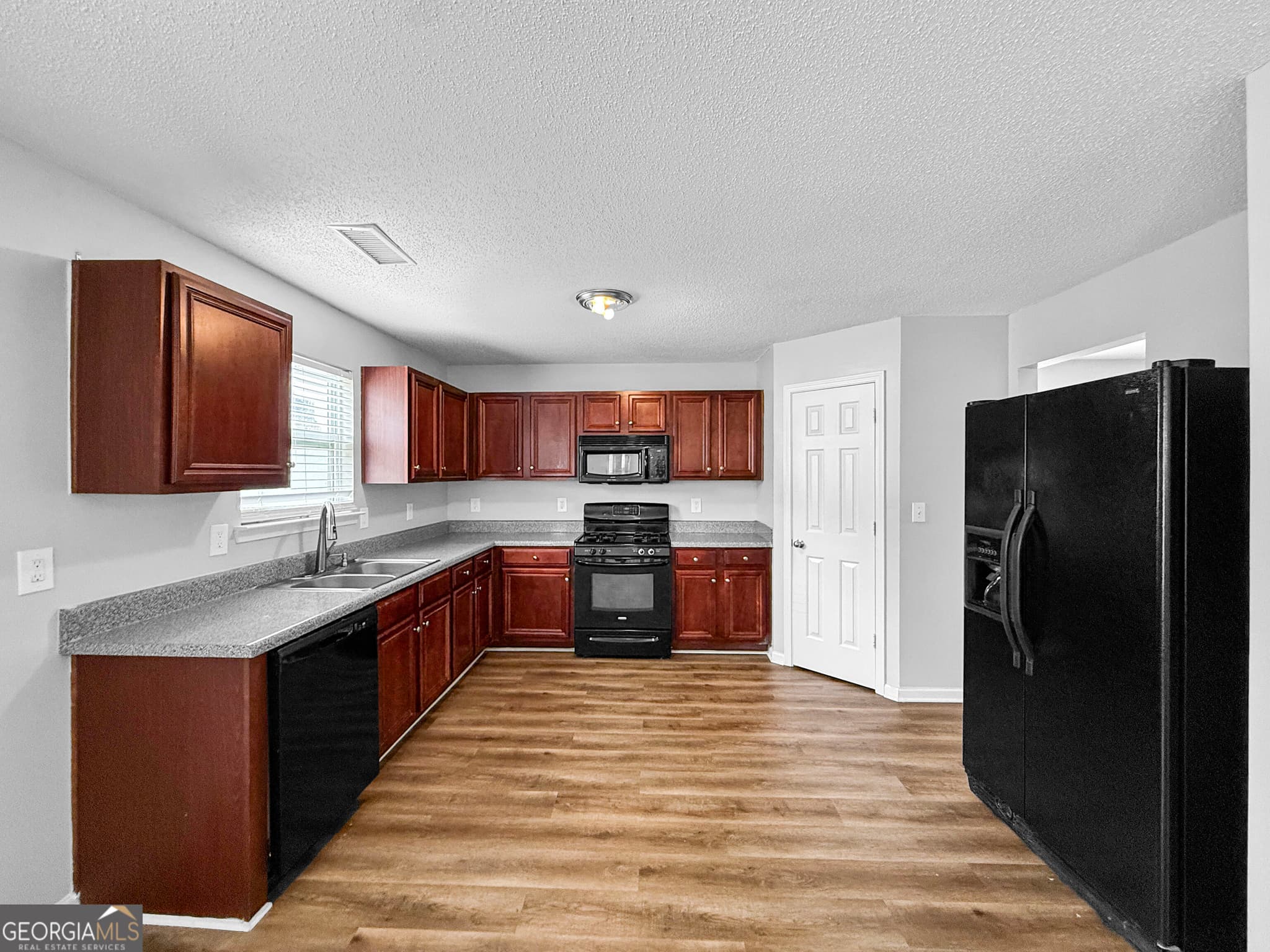 5 bedroom, 2.5 bathroom, 5,196 sq ft single family residence for rent at 131 Laughlin Drive, Locust Grove, GA 30248 for $2,285 a month — photo 7