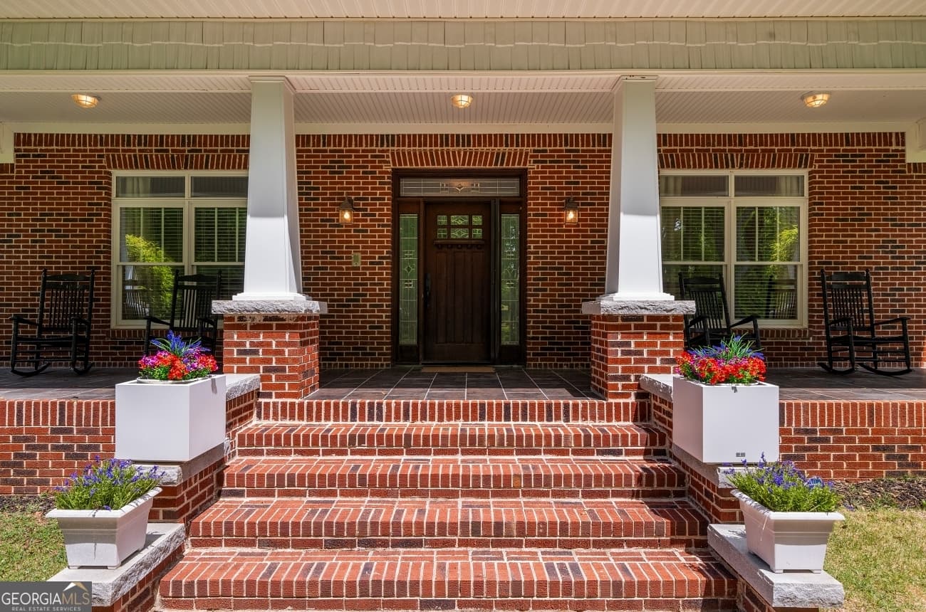 5 bedroom, 6 bathroom, 8,414 sq ft single family residence for sale at 11905 Hutcheson Ferry Road, Chattahoochee Hills, GA 30268 — photo 6