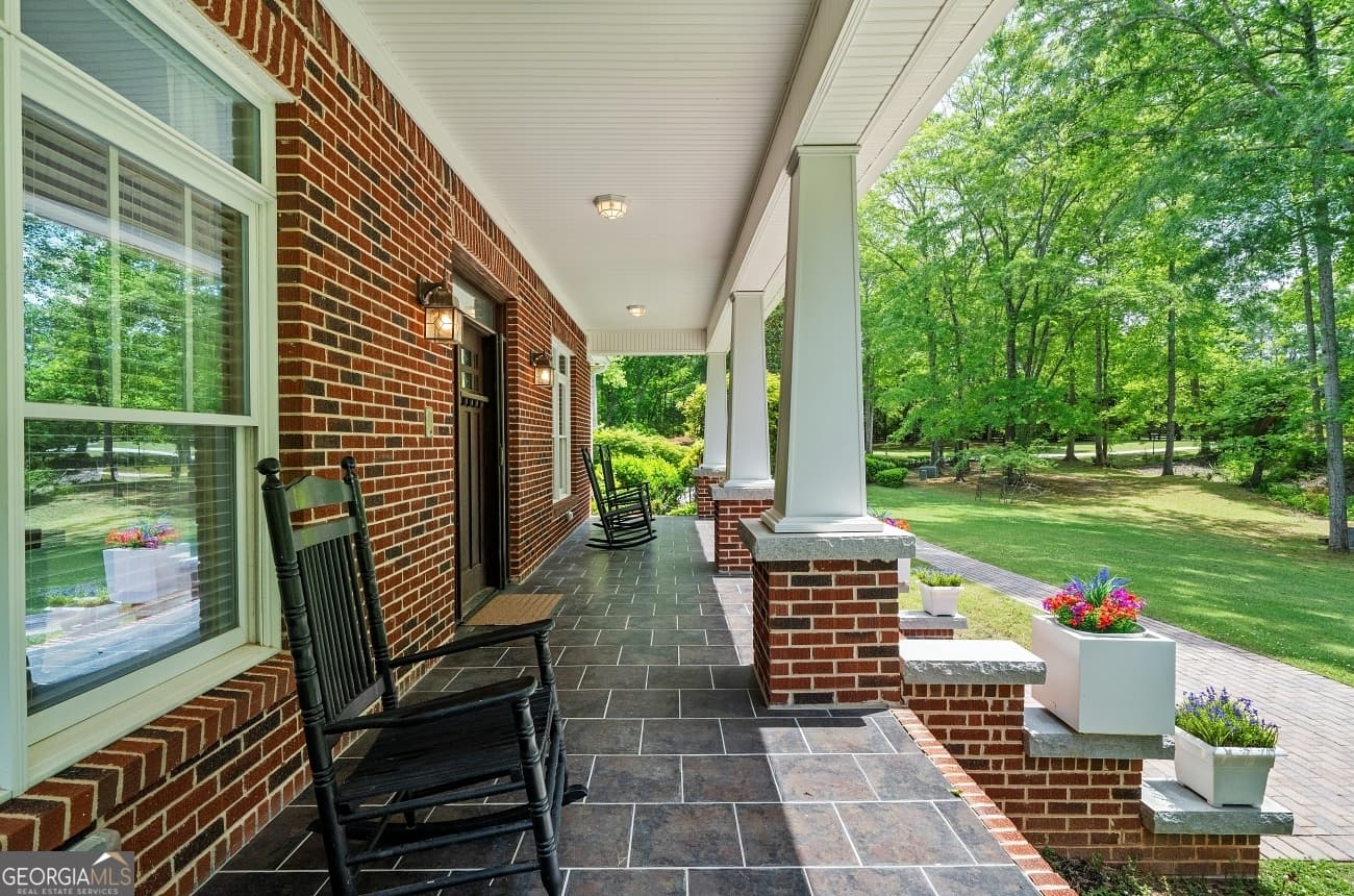 5 bedroom, 6 bathroom, 8,414 sq ft single family residence for sale at 11905 Hutcheson Ferry Road, Chattahoochee Hills, GA 30268 — photo 8