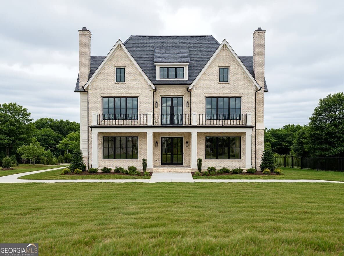 5 bedroom, 4 bathroom, 4,300 sq ft single family residence for sale at 595 E Main Street, Buford, GA 30518 — photo 2