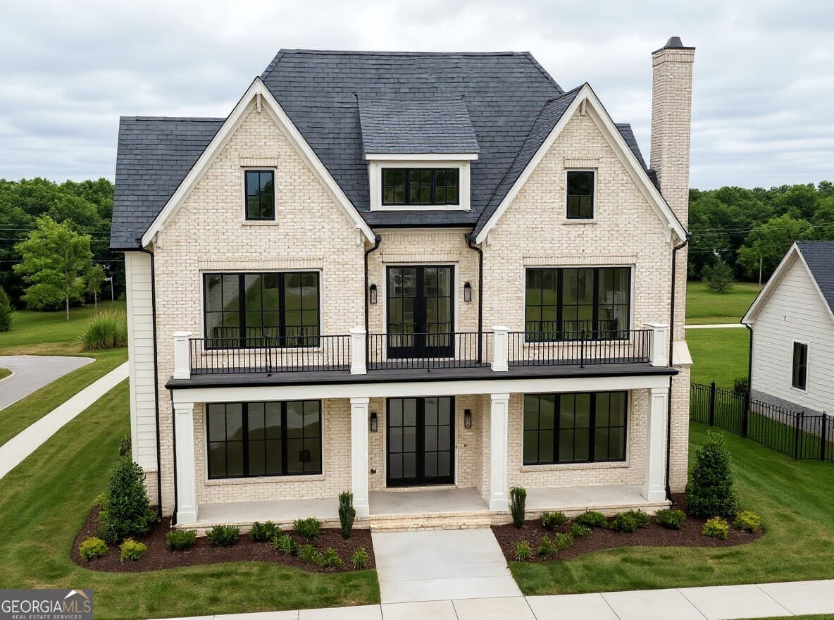 5 bedroom, 4 bathroom, 4,300 sq ft single family residence for sale at 595 E Main Street, Buford, GA 30518 — photo 3