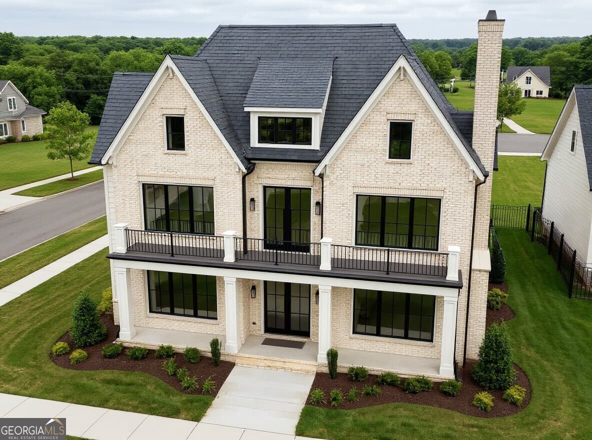 5 bedroom, 4 bathroom, 4,300 sq ft single family residence for sale at 595 E Main Street, Buford, GA 30518 — photo 4