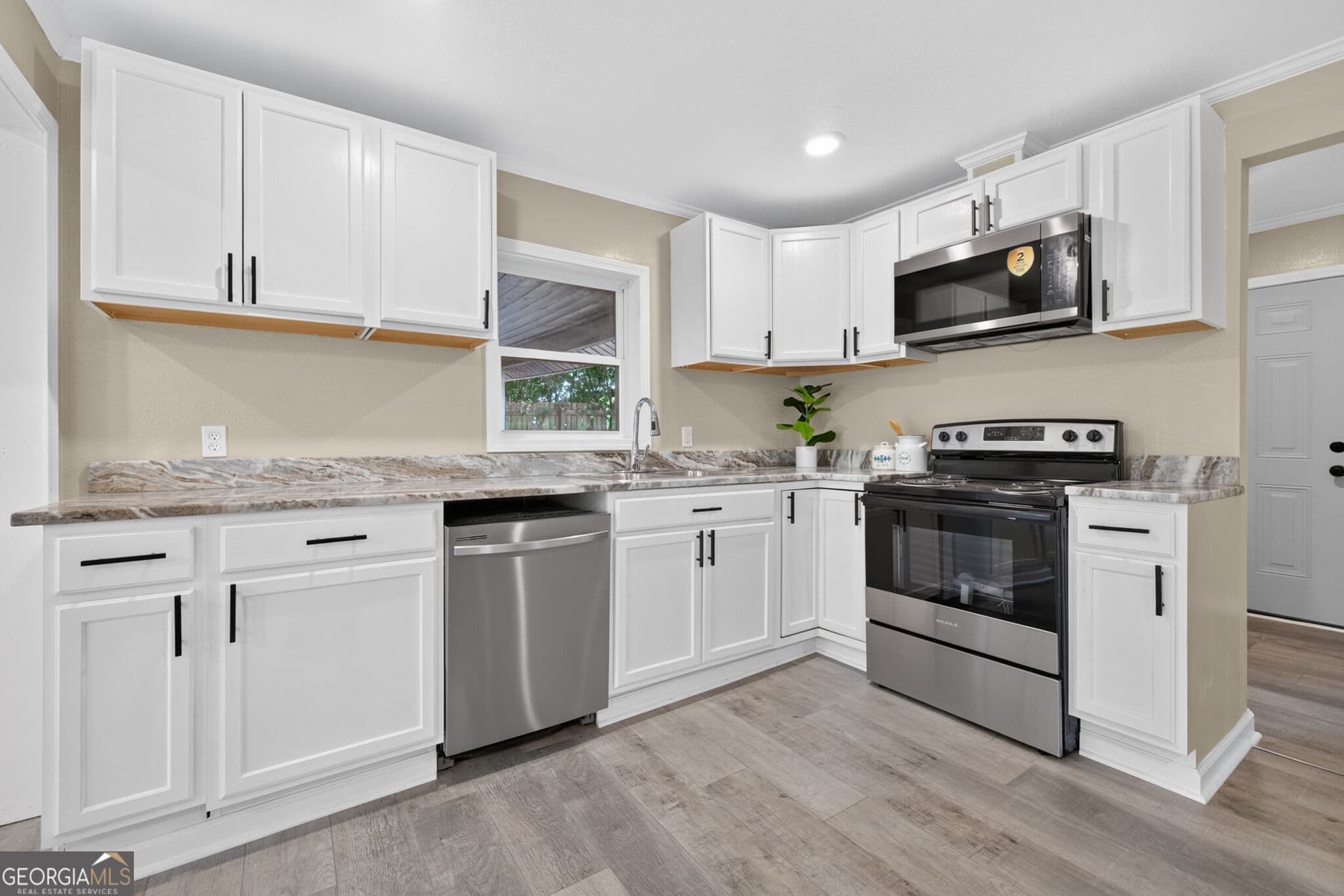 3 bedroom, 2 bathroom, 1,200 sq ft single family residence for sale at 205 Elm Street, Washington, GA 30673 — photo 4