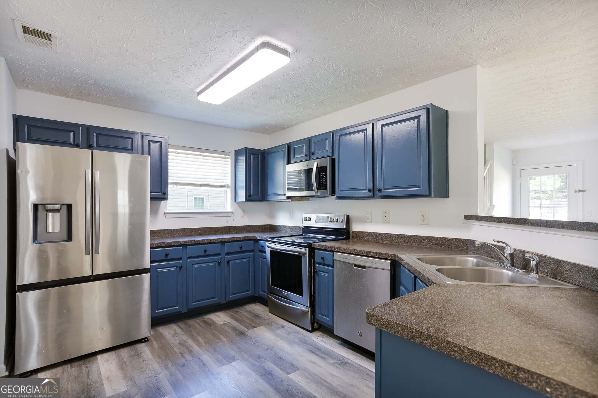 4 bedroom, 2.5 bathroom, 2,290 sq ft single family residence for sale at 7590 Crimson Court, Jonesboro, GA 30236 — photo 7