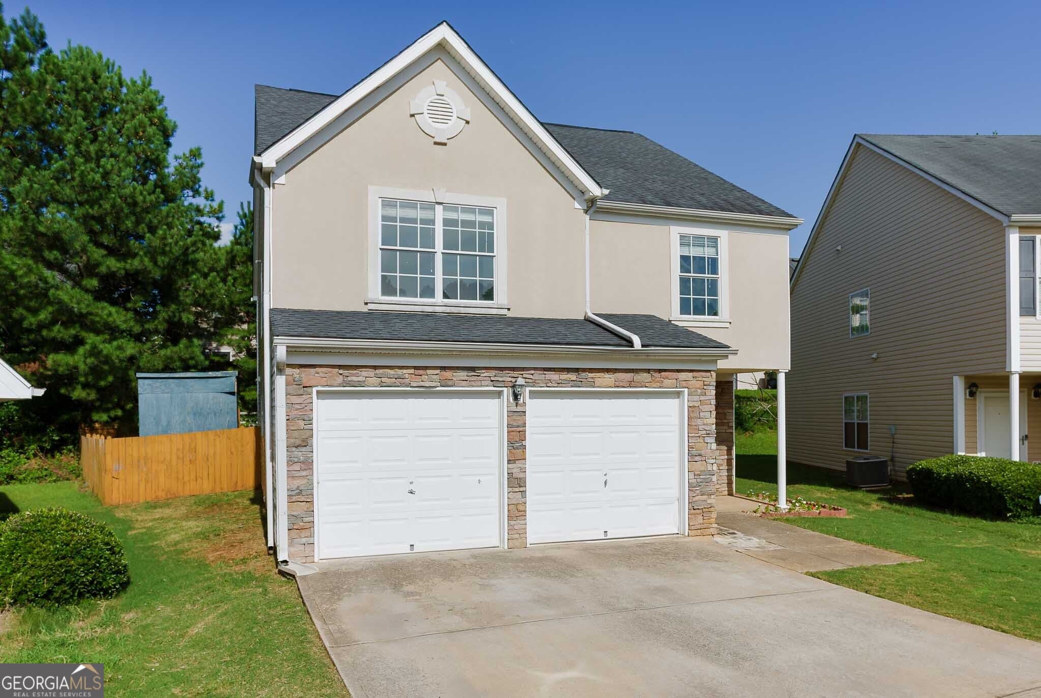 4 bedroom, 2.5 bathroom, 2,290 sq ft single family residence for sale at 7590 Crimson Court, Jonesboro, GA 30236 — photo 3