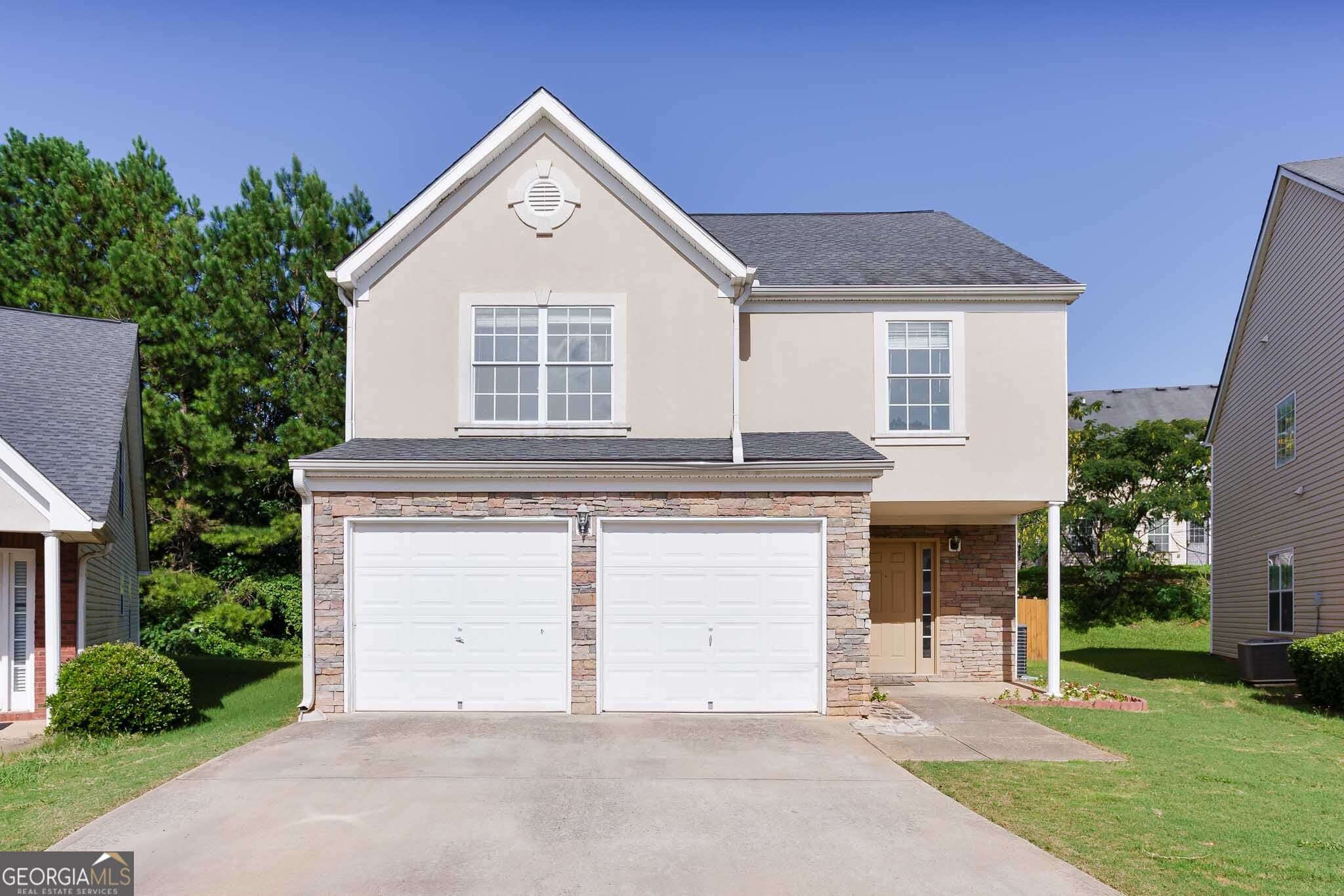 4 bedroom, 2.5 bathroom, 2,290 sq ft single family residence for sale at 7590 Crimson Court, Jonesboro, GA 30236 — photo 1 of 30