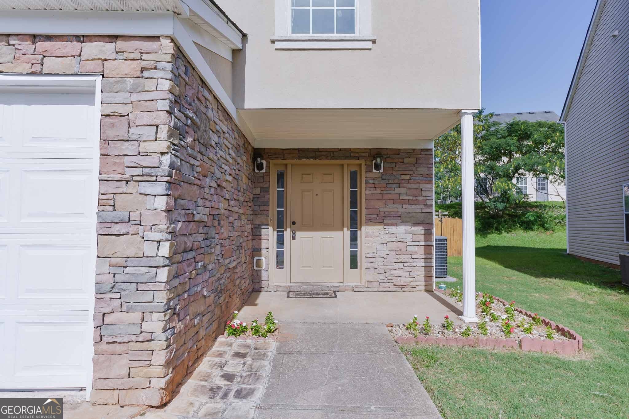 4 bedroom, 2.5 bathroom, 2,290 sq ft single family residence for sale at 7590 Crimson Court, Jonesboro, GA 30236 — photo 4