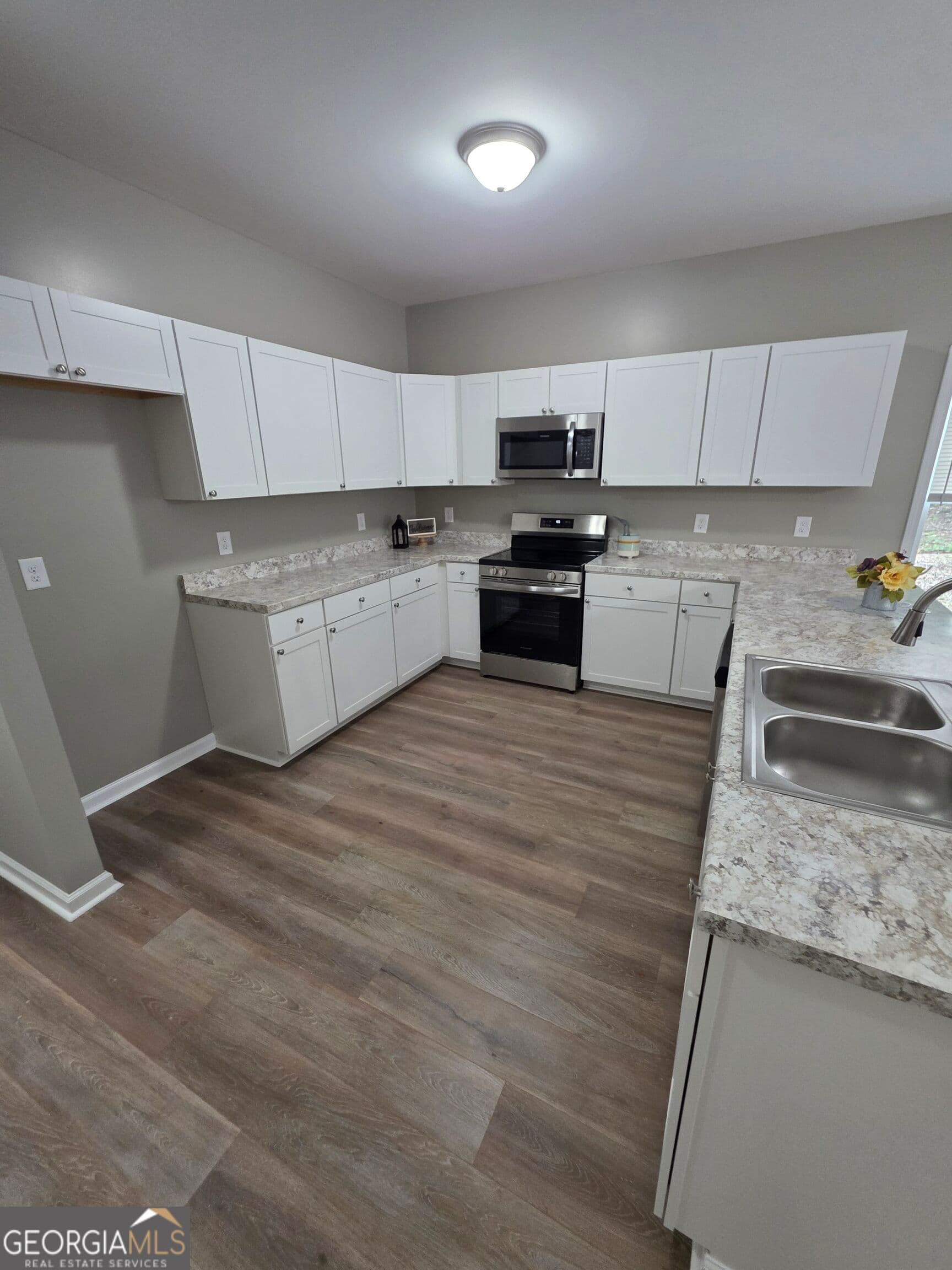4 bedroom, 2.5 bathroom, 2,015 sq ft single family residence for sale at 67 Woodbine Street, Commerce, GA 30529 — photo 5