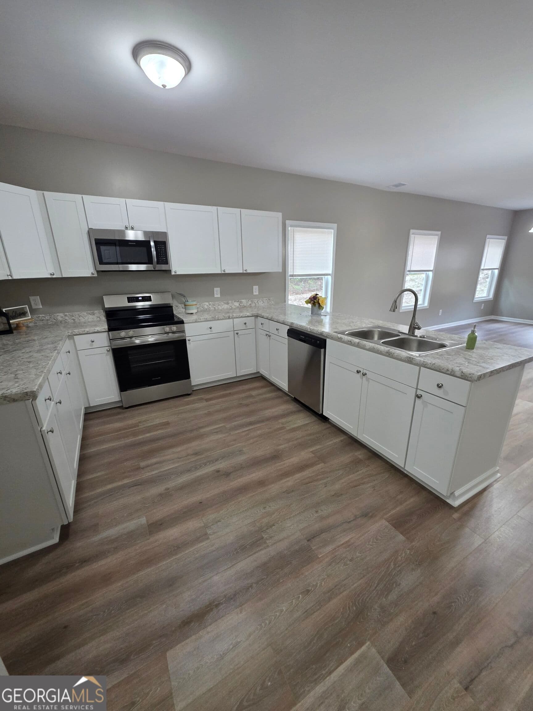 4 bedroom, 2.5 bathroom, 2,015 sq ft single family residence for sale at 67 Woodbine Street, Commerce, GA 30529 — photo 8