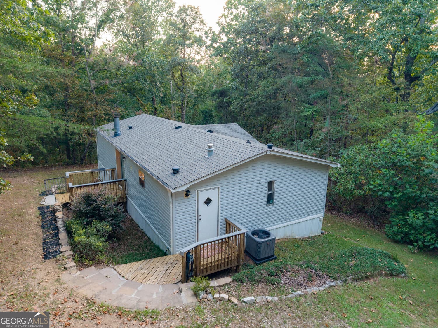 3 bedroom, 2 bathroom, 1,152 sq ft manufactured home,single family residence for sale at 81 Cherokee Trail, Ball Ground, GA 30107 — photo 3