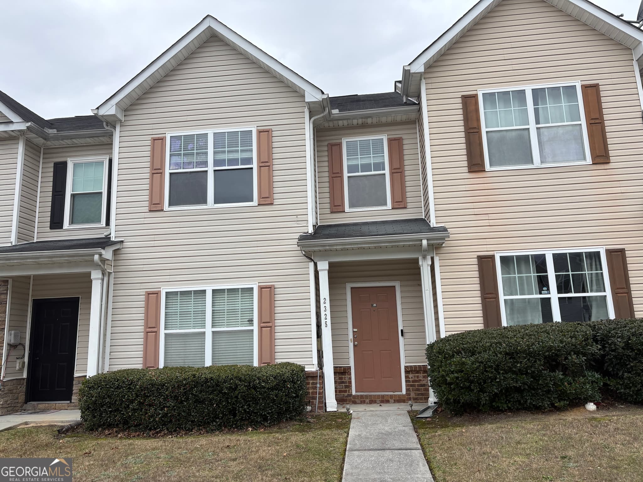 2 bedroom, 2.5 bathroom, 1,568 sq ft townhouse for sale at 2325 Bigwood Trail, Atlanta, GA 30349