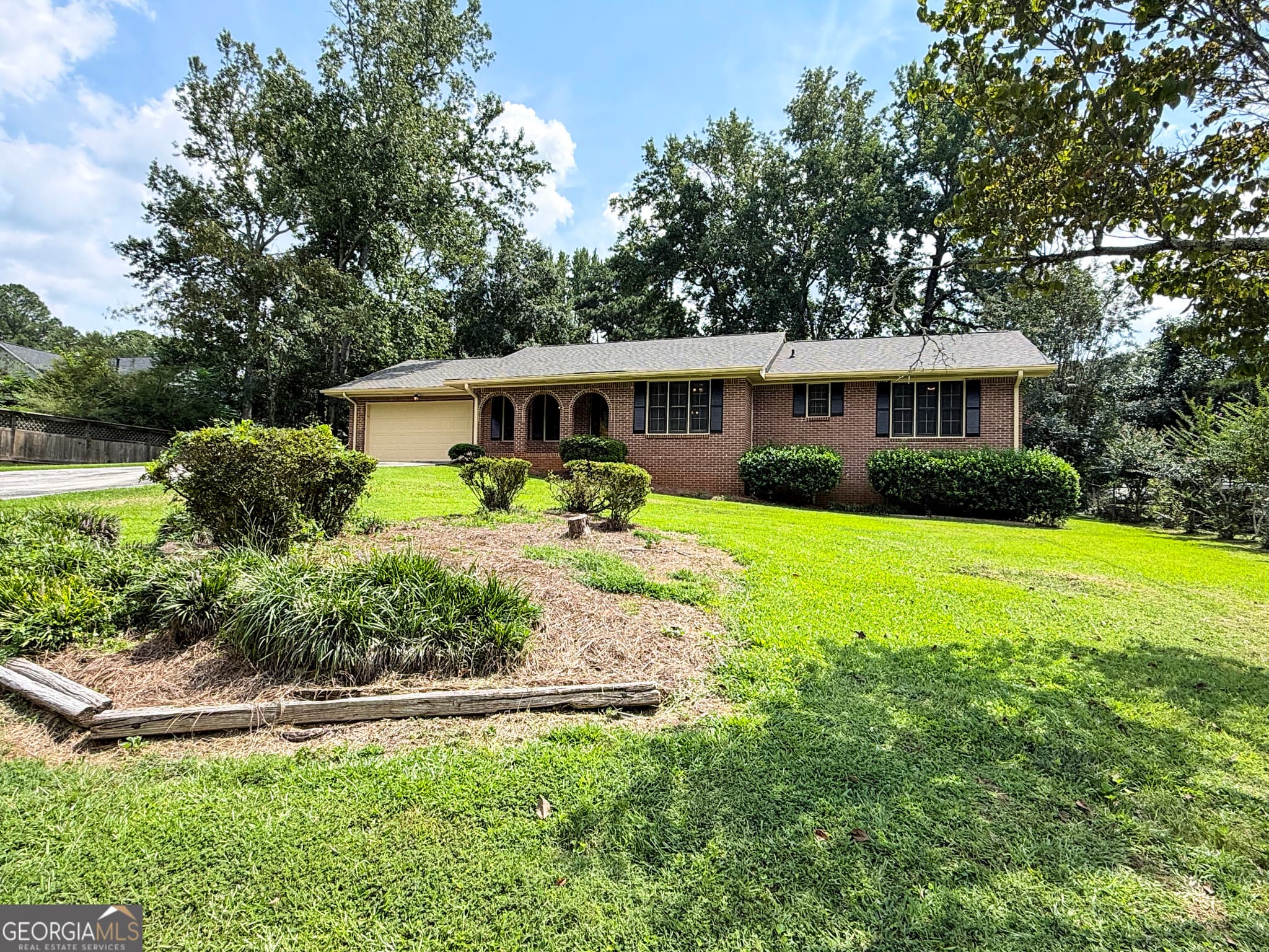3 bedroom, 2 bathroom, 1,706 sq ft single family residence for sale at 2305 Village Drive, Covington, GA 30016 — photo 1 of 44